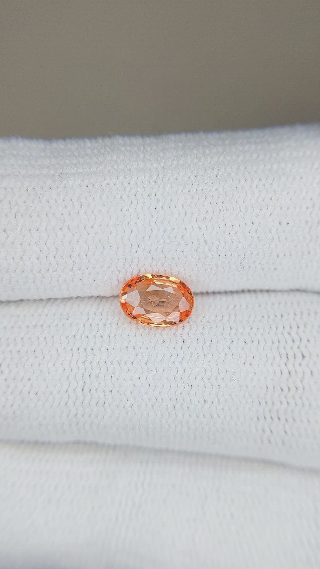 0.74 Ct. Orange Sapphire from Madagascar Size Video