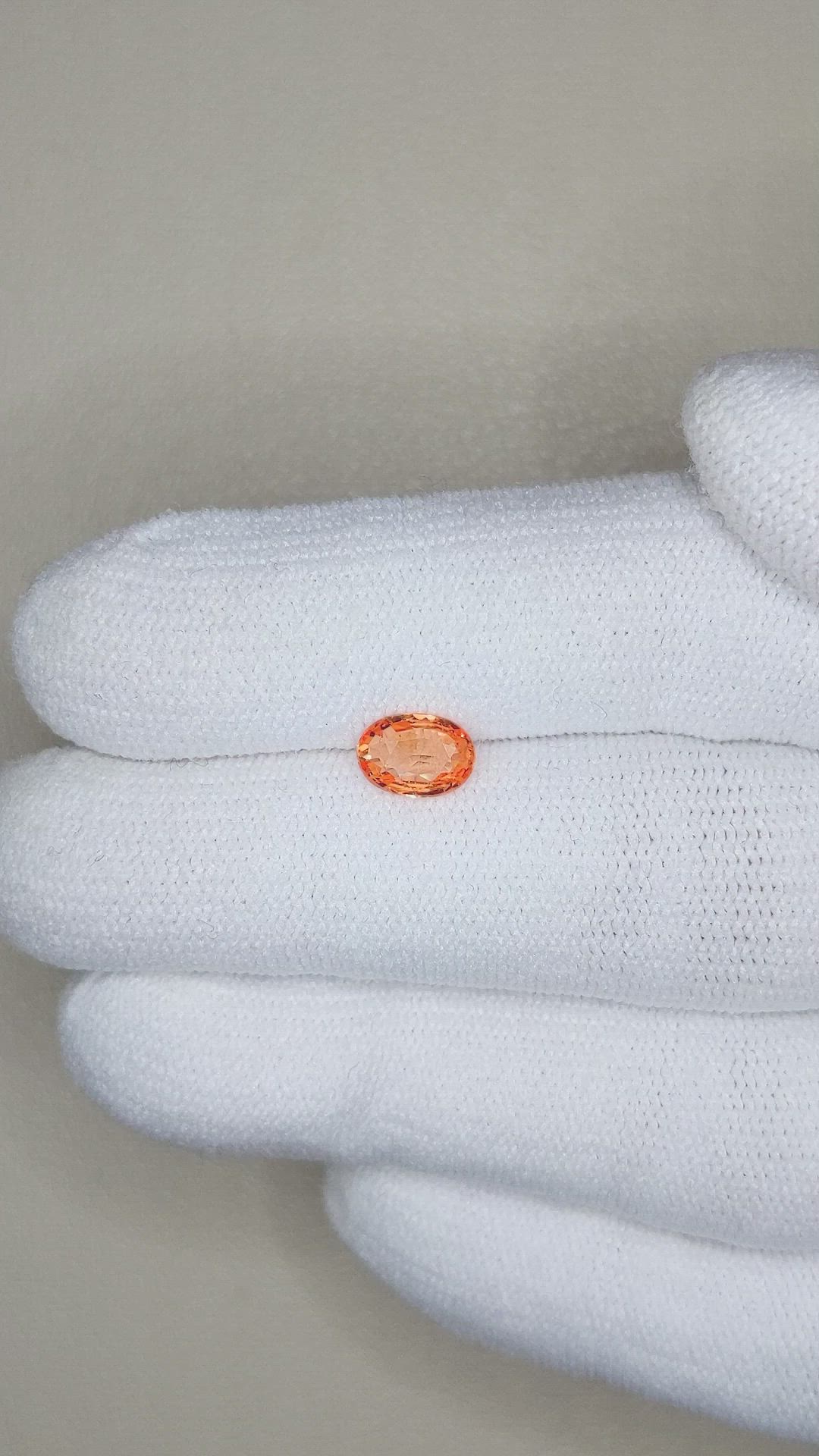 0.74 Ct. Orange Sapphire from Madagascar Size Video