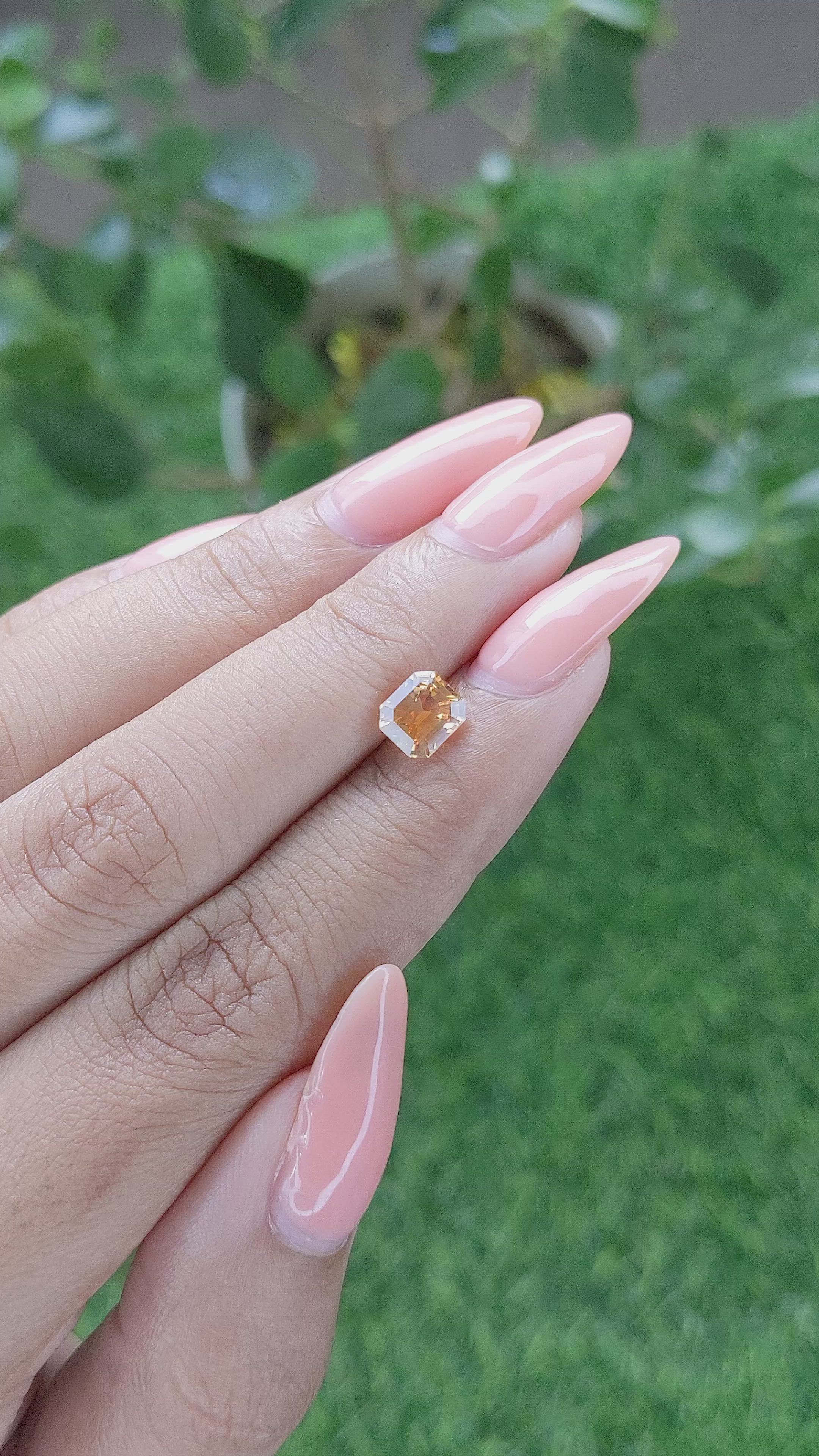 1.47 Ct. Orangish Yellow Sapphire from Madagascar Size Video