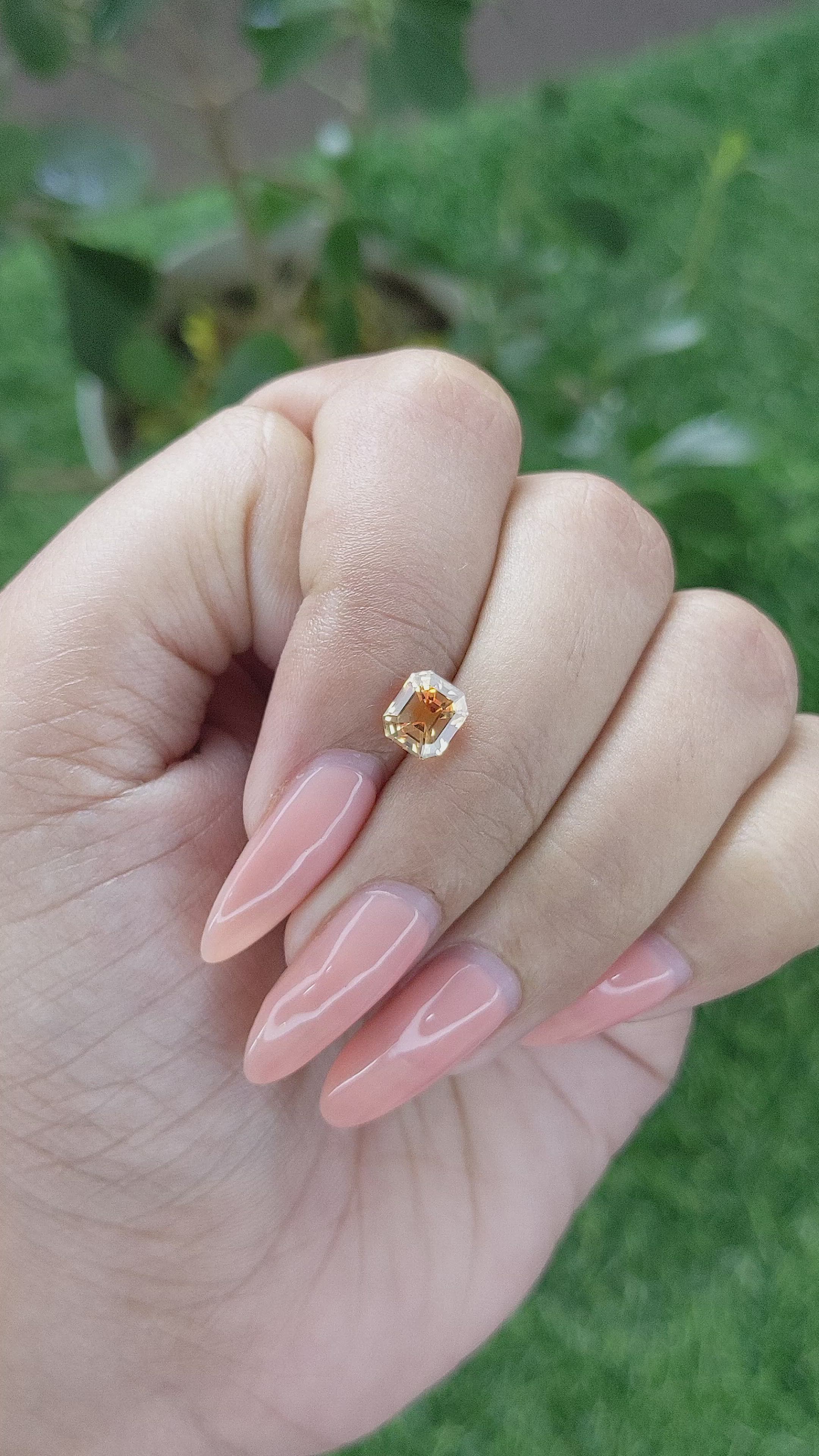 1.47 Ct. Orangish Yellow Sapphire from Madagascar Size Video
