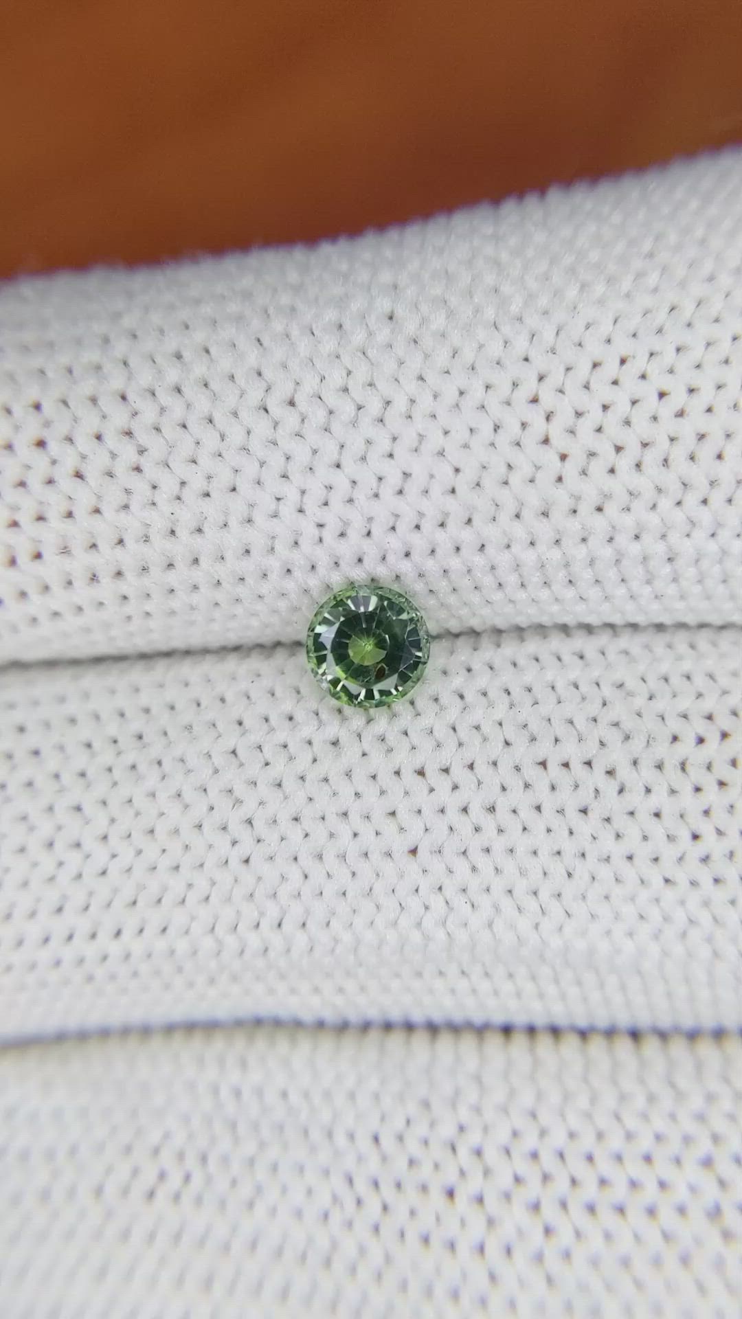 0.68 Ct. Yellowish Green Sapphire from Madagascar Size Video