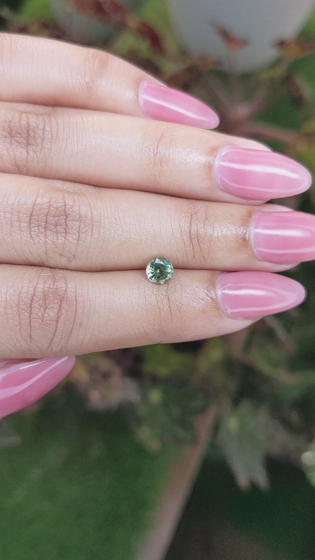 0.68 Ct. Yellowish Green Sapphire from Madagascar Size Video