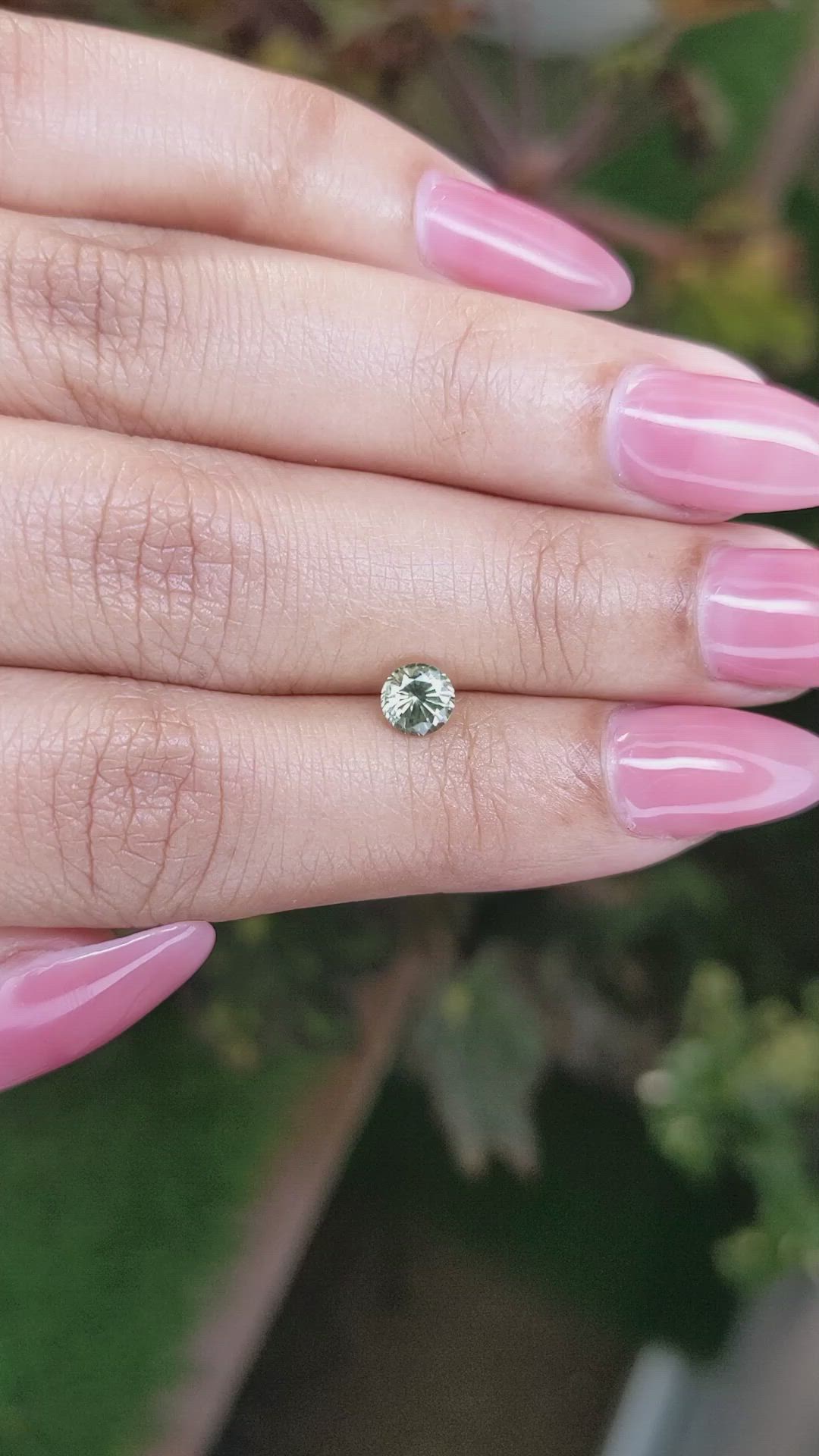 0.66 Ct. Yellowish Green Sapphire from Madagascar Size Video