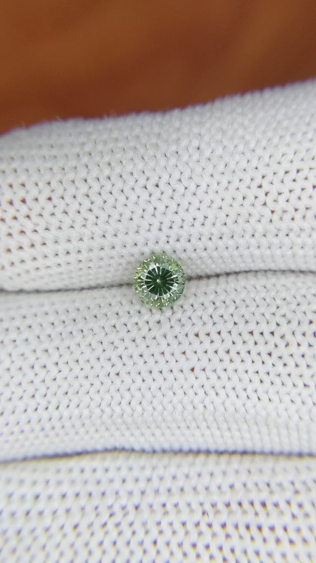 0.66 Ct. Yellowish Green Sapphire from Madagascar Size Video