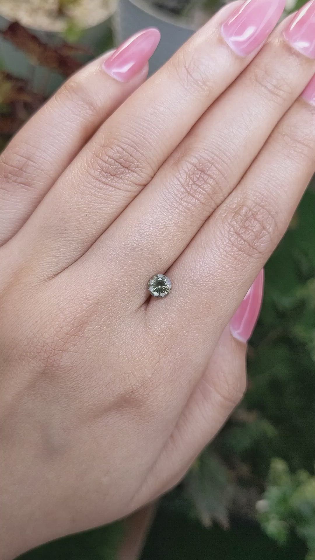 0.72 Ct. Yellowish Green Sapphire from Madagascar Size Video