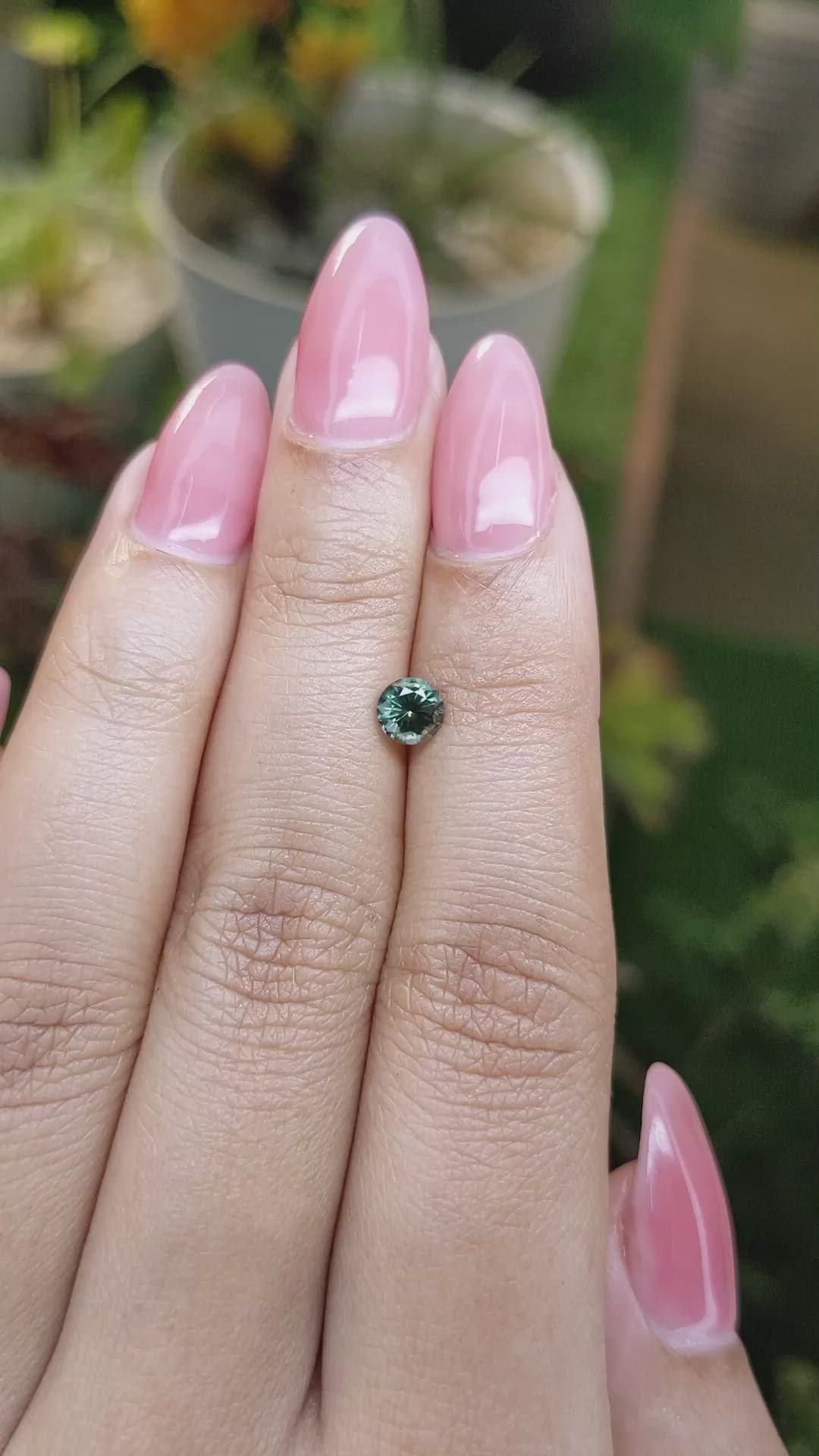 0.60 Ct. Bluish Green Sapphire from Madagascar Size Video