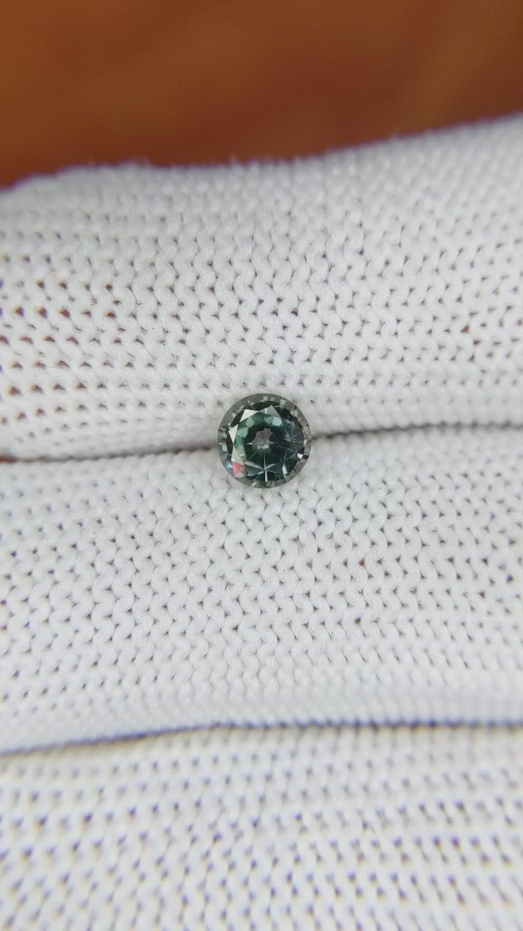 0.76 Ct. Bluish Green Sapphire from Madagascar Size Video