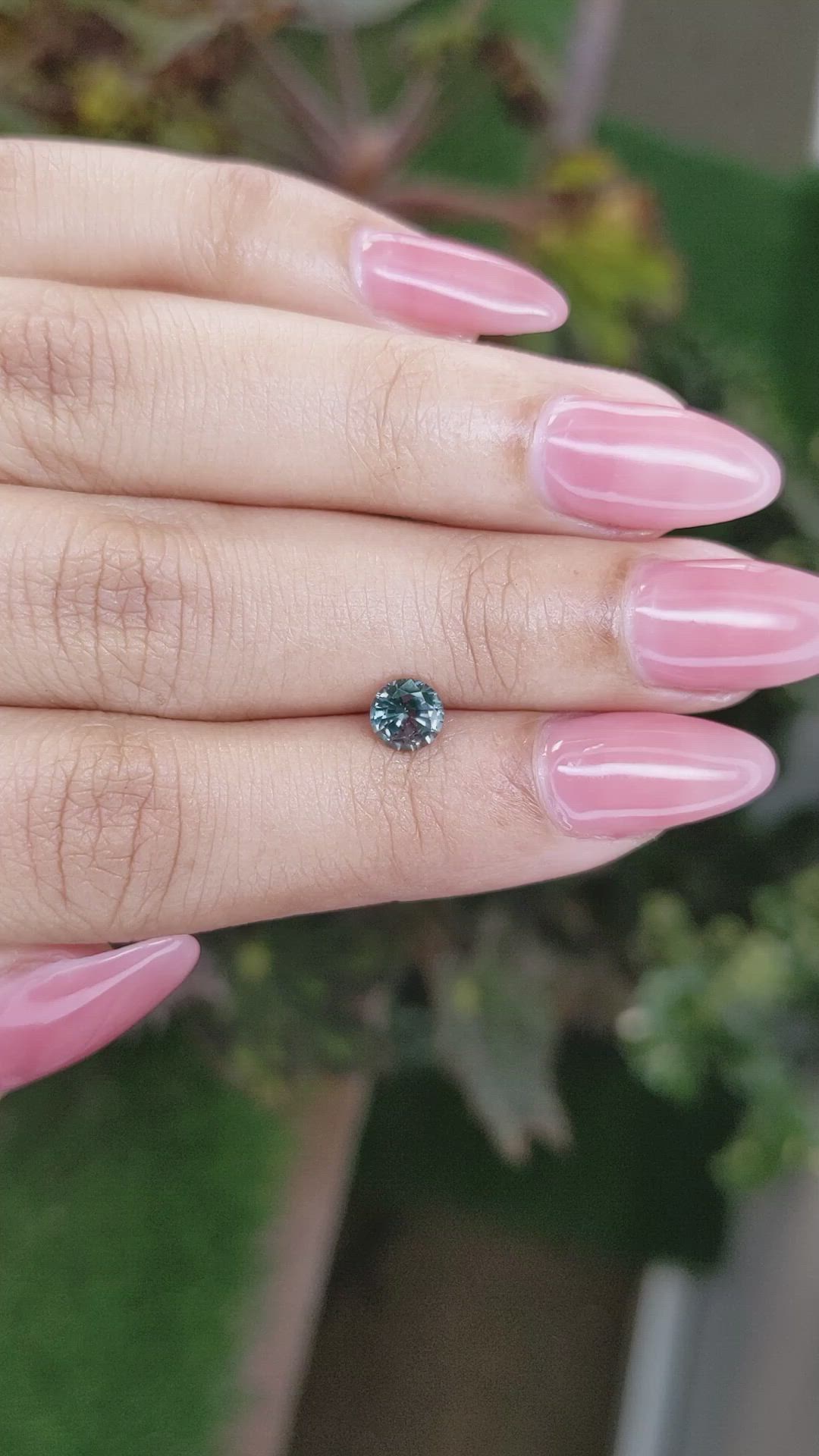 0.76 Ct. Bluish Green Sapphire from Madagascar Size Video