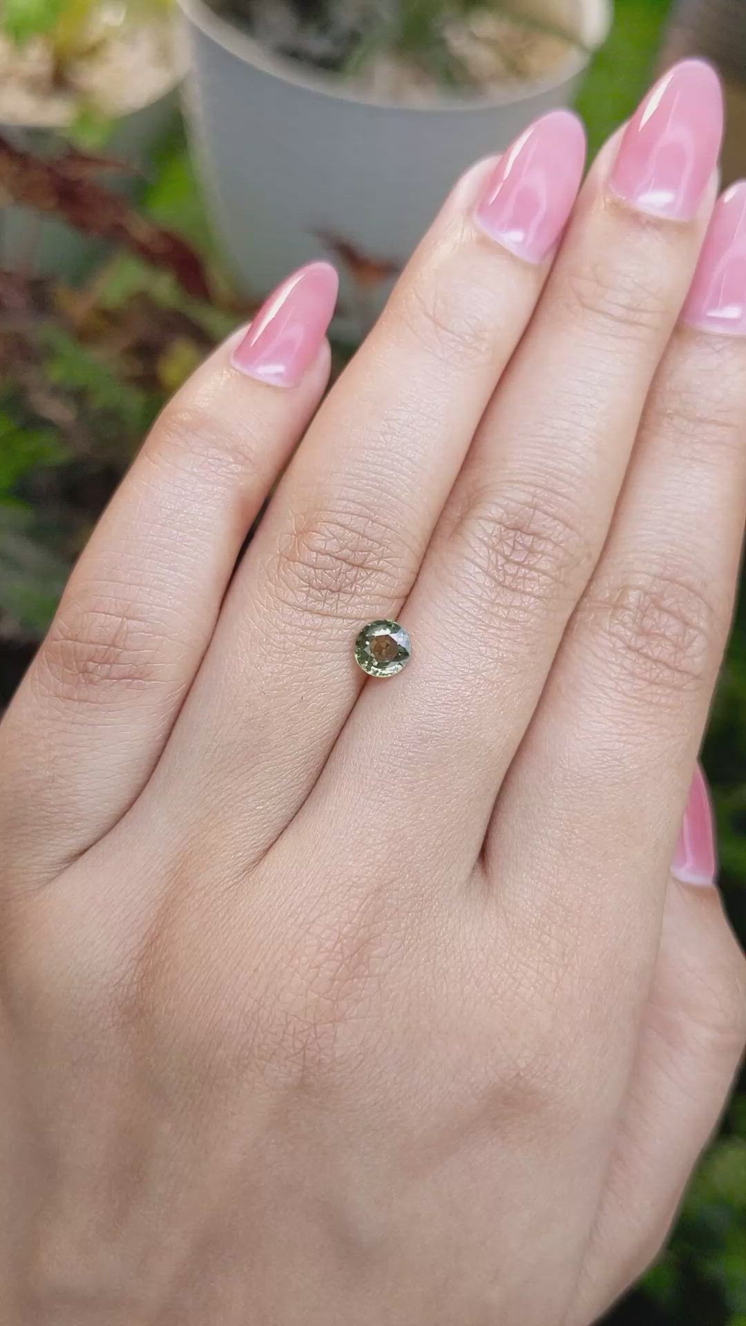 0.82 Ct. Yellowish Green Sapphire from Madagascar Size Video