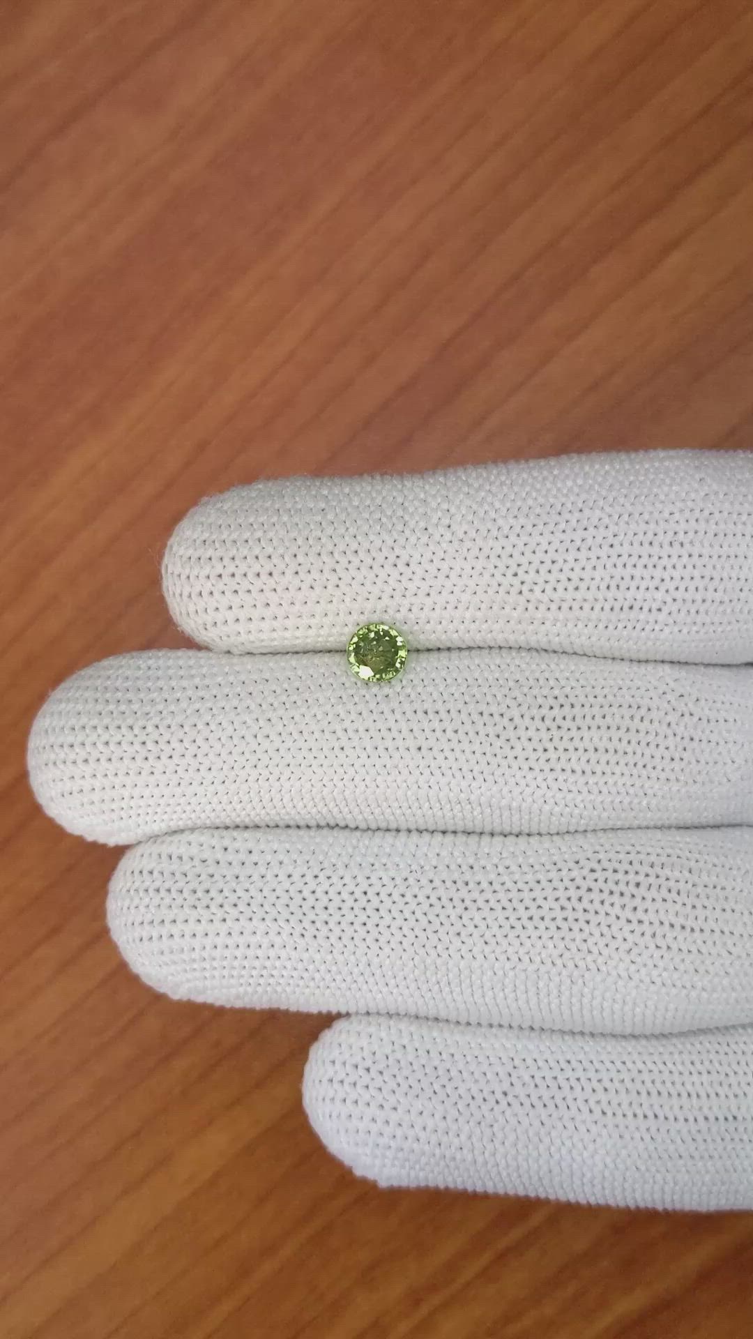 0.82 Ct. Yellowish Green Sapphire from Madagascar Size Video