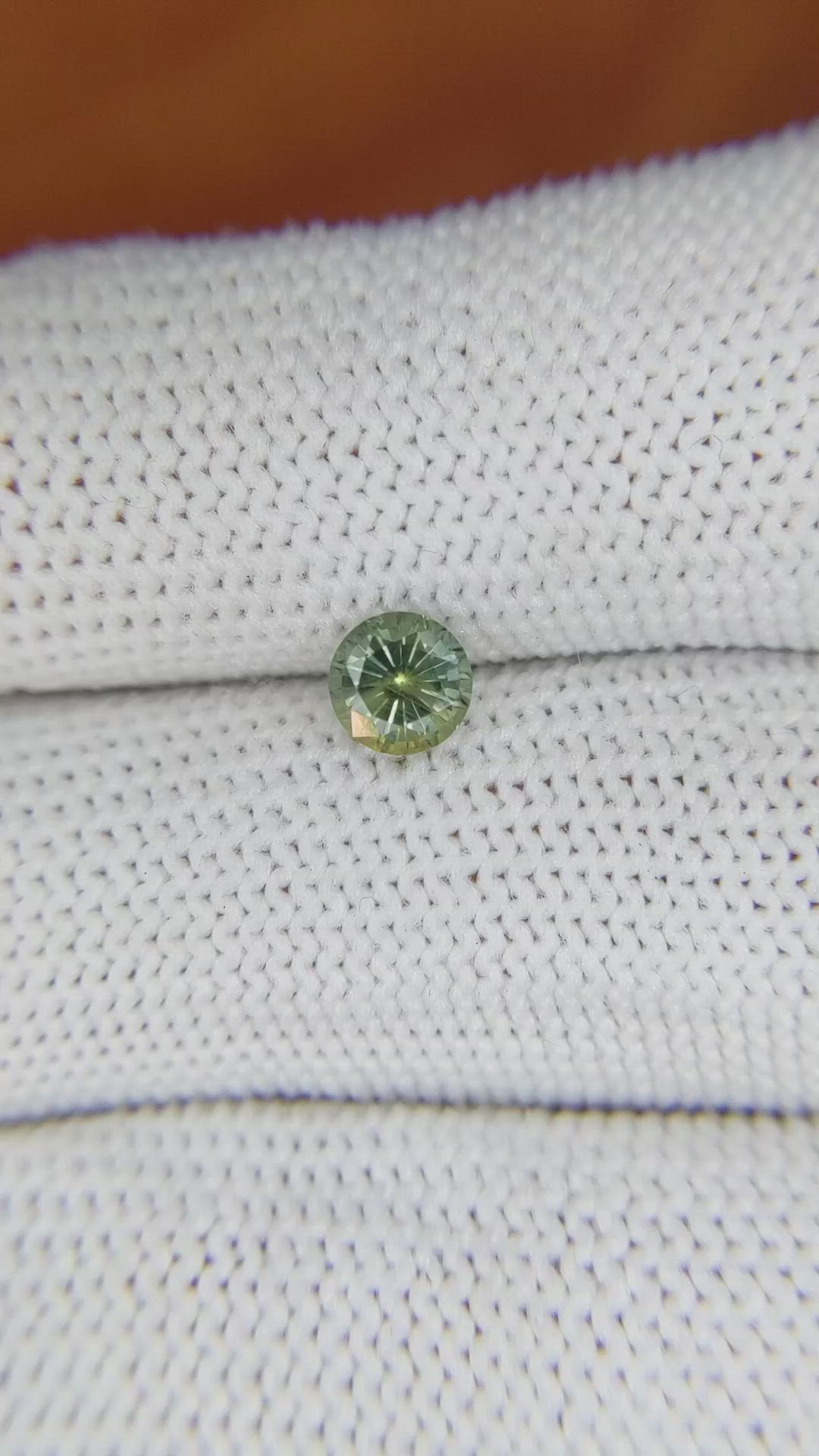 0.71 Ct. Yellowish Green Sapphire from Madagascar Size Video