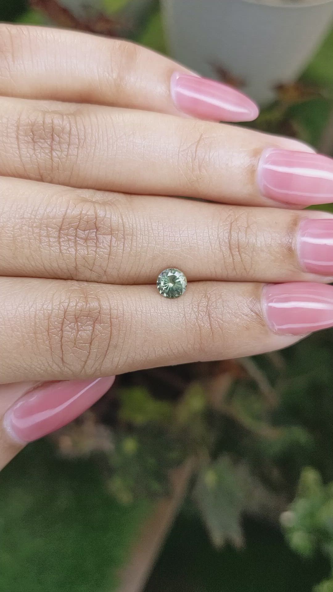 0.71 Ct. Yellowish Green Sapphire from Madagascar Size Video