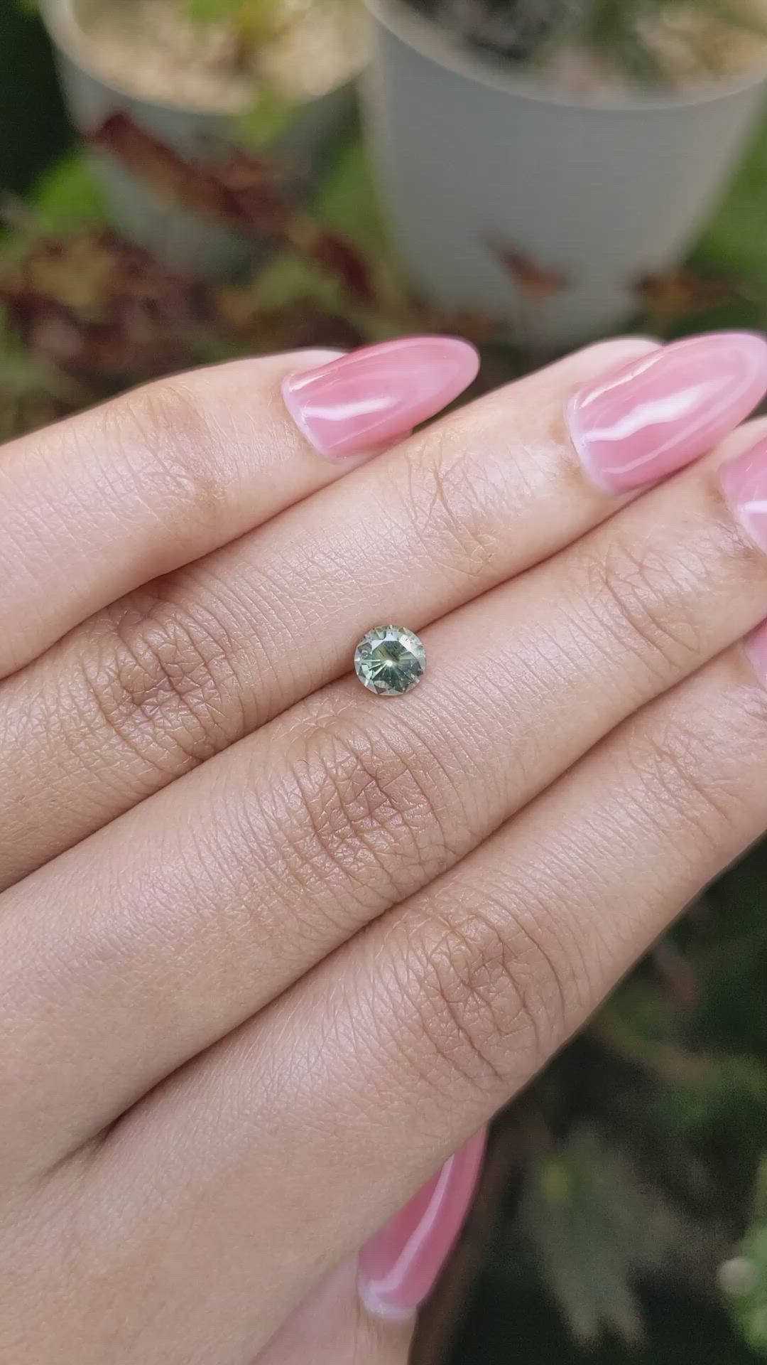 0.71 Ct. Yellowish Green Sapphire from Madagascar Size Video