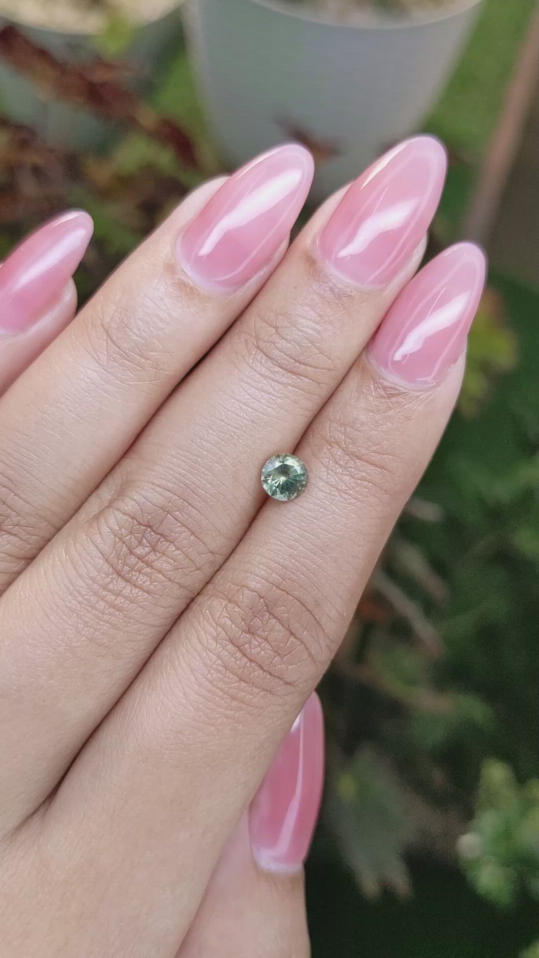 0.71 Ct. Yellowish Green Sapphire from Madagascar Size Video