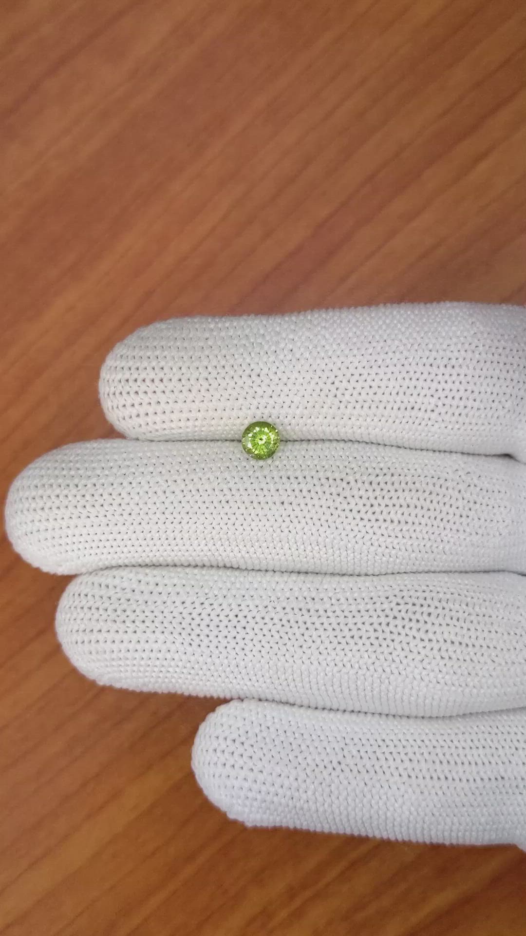 0.58 Ct. Yellowish Green Sapphire from Madagascar Size Video