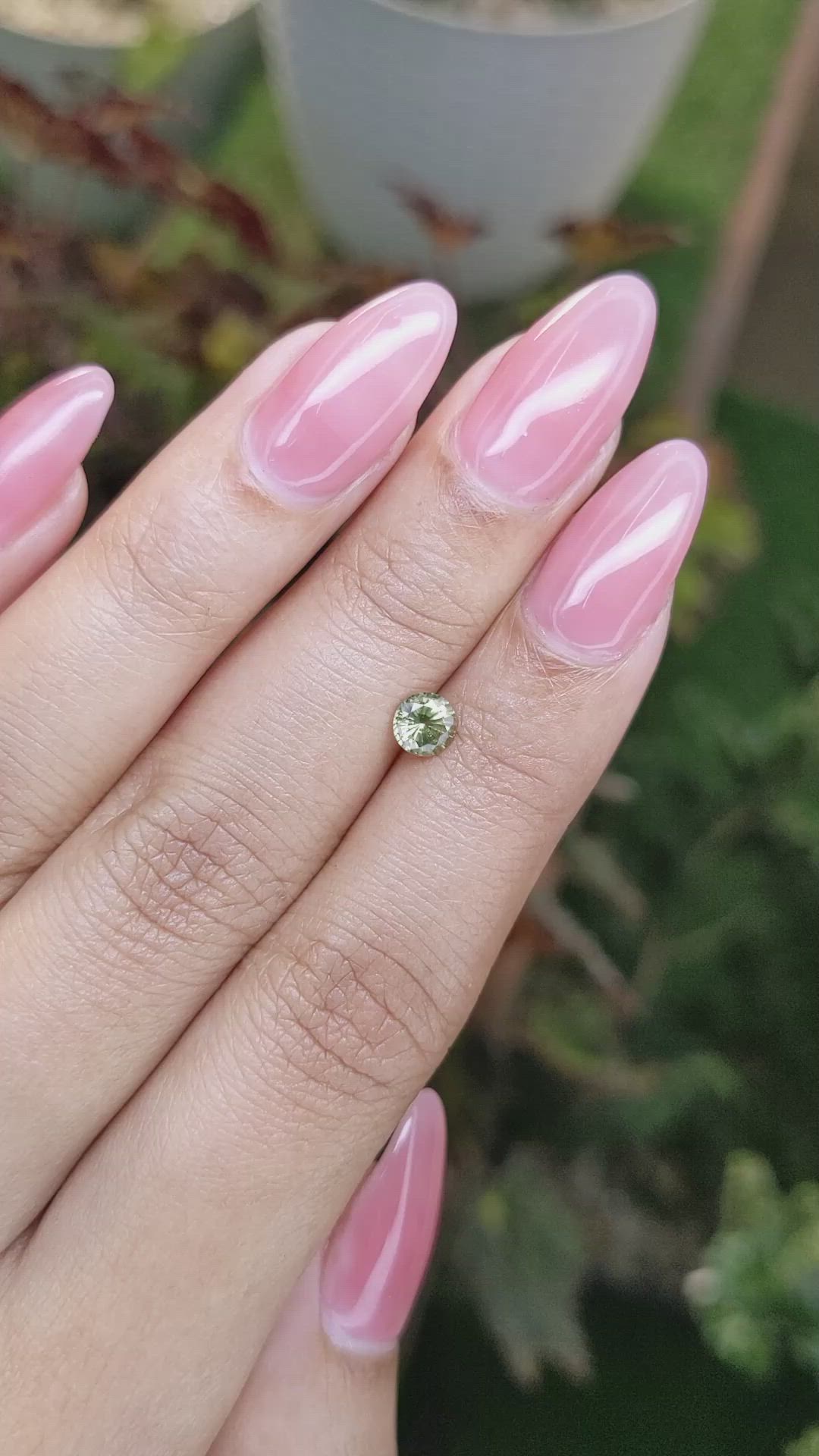 0.58 Ct. Yellowish Green Sapphire from Madagascar Size Video