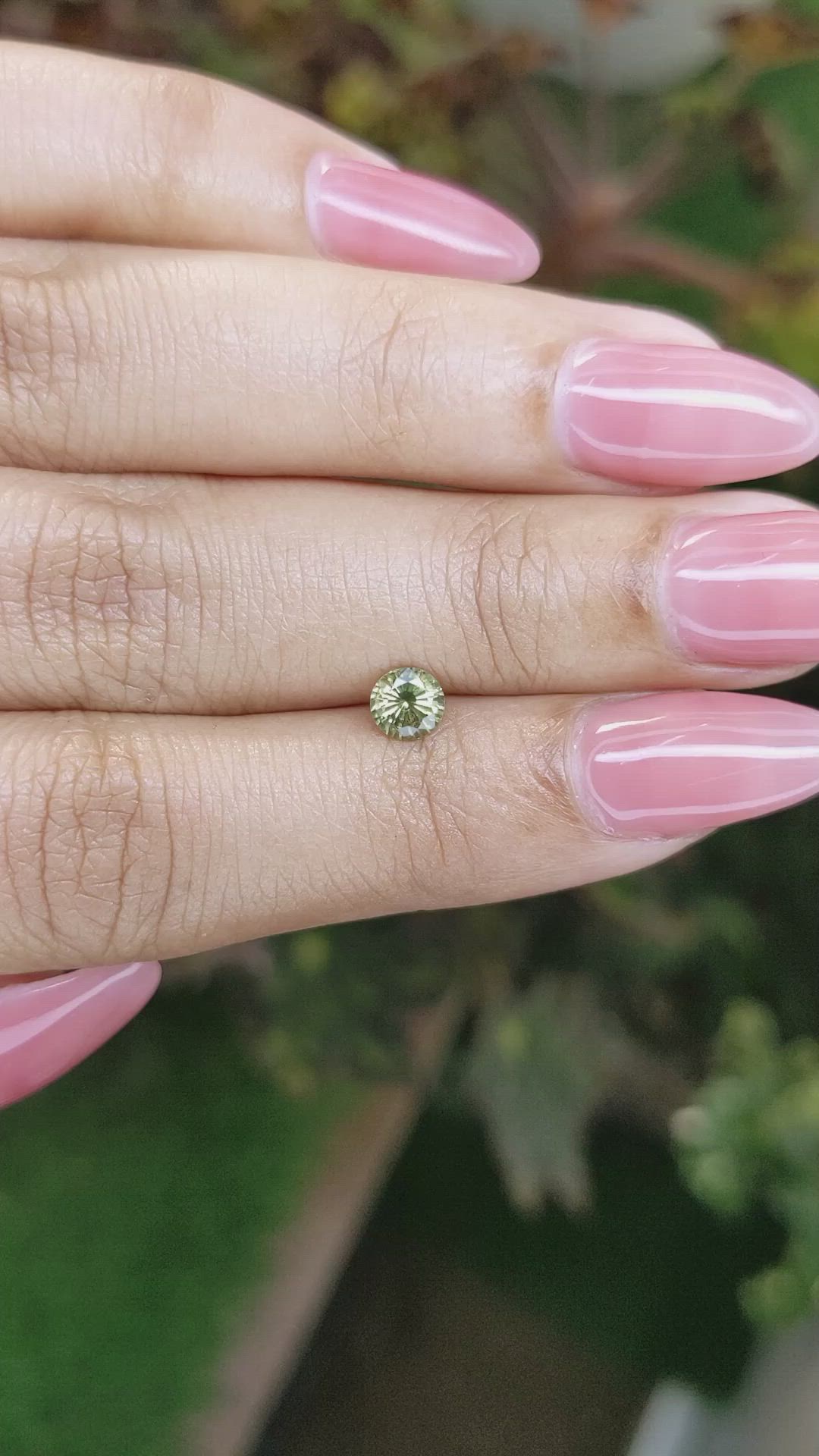 0.58 Ct. Yellowish Green Sapphire from Madagascar Size Video