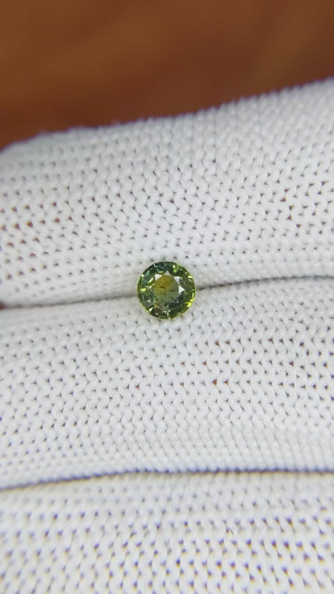 0.68 Ct. Yellowish Green Sapphire from Madagascar Size Video