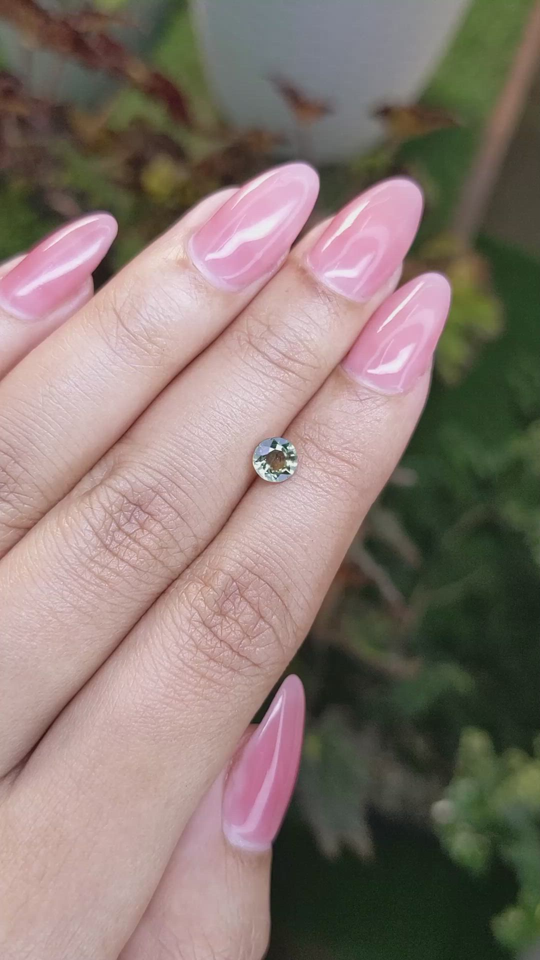 0.68 Ct. Yellowish Green Sapphire from Madagascar Size Video