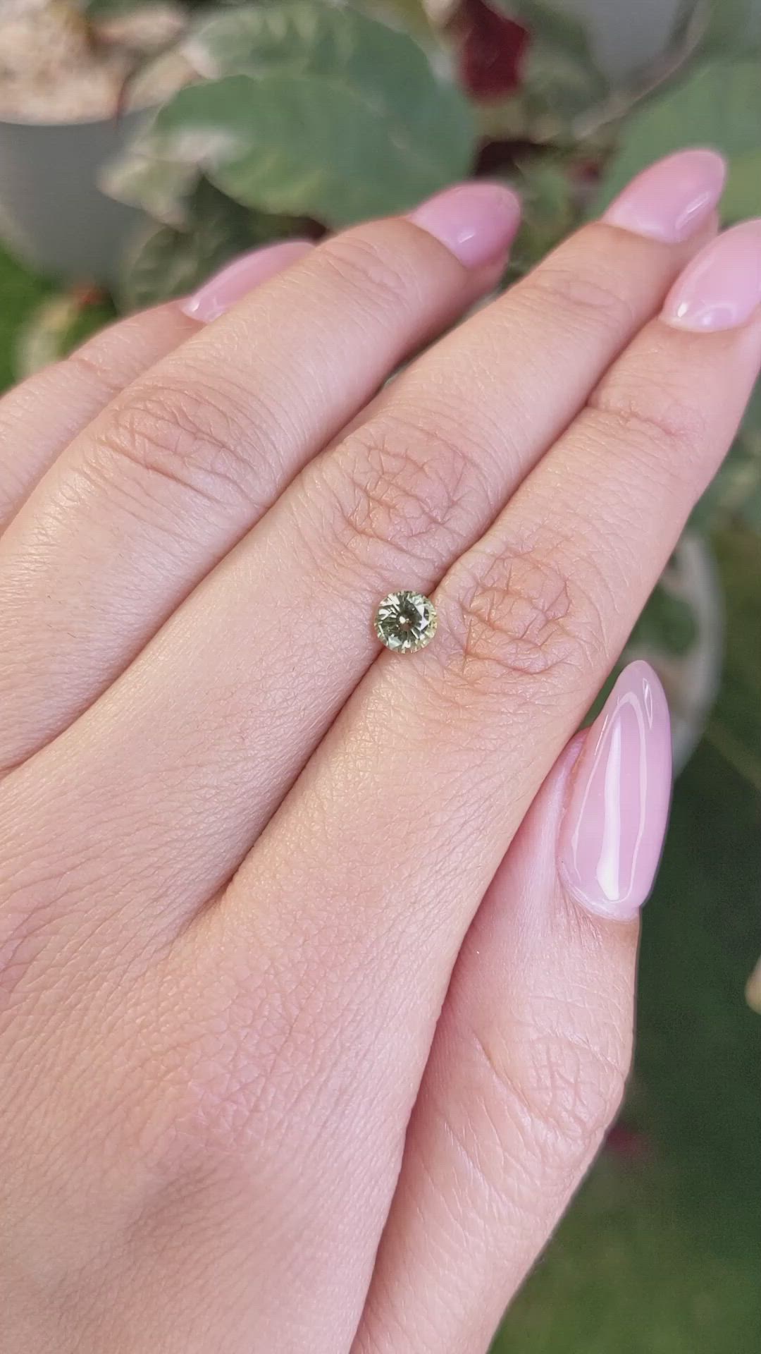 0.64 Ct. Greenish Yellow Sapphire from Madagascar Size Video