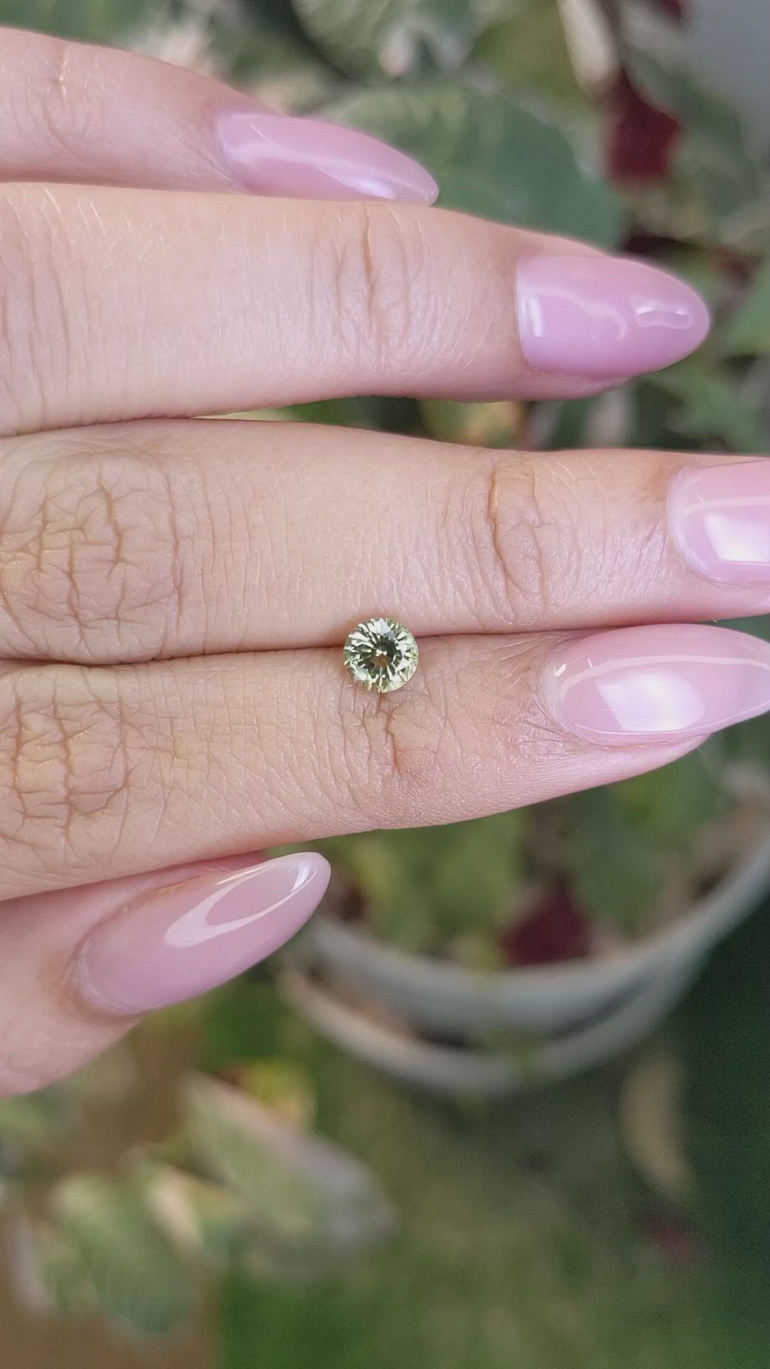 0.64 Ct. Greenish Yellow Sapphire from Madagascar Size Video