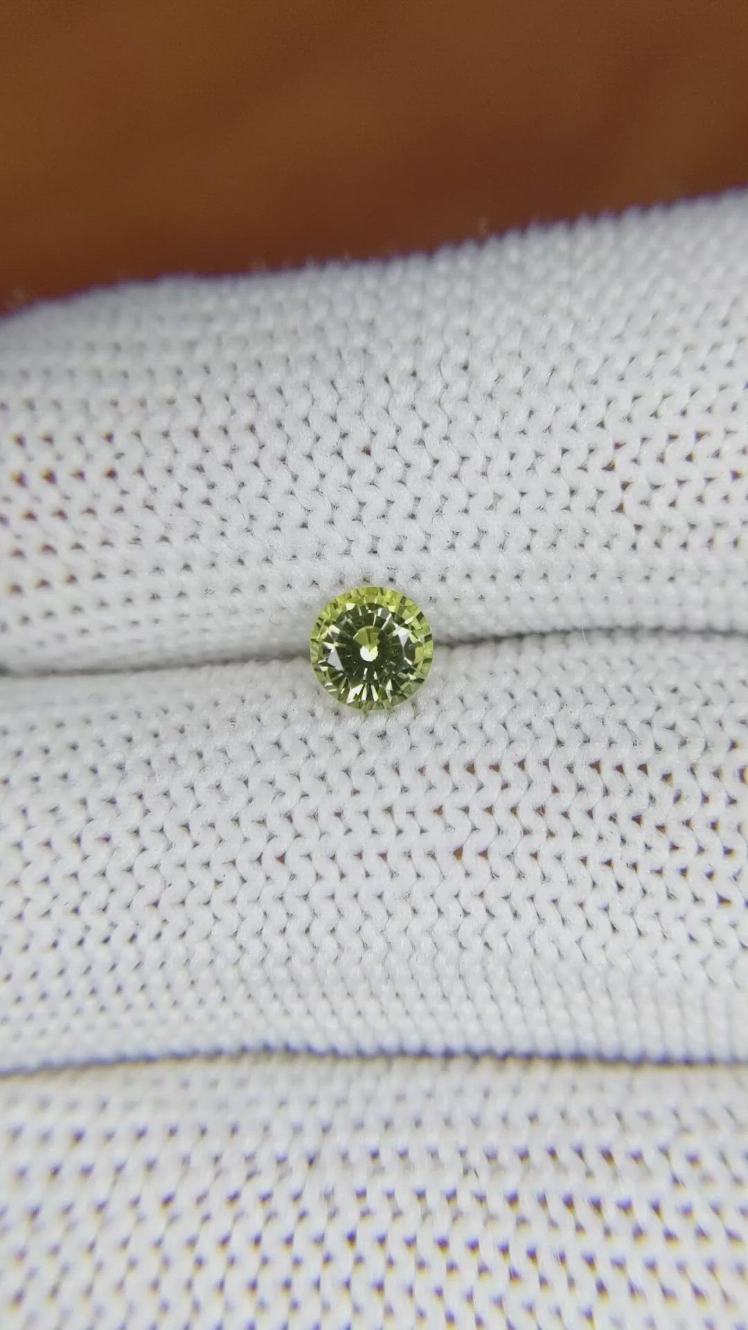 0.64 Ct. Greenish Yellow Sapphire from Madagascar Size Video