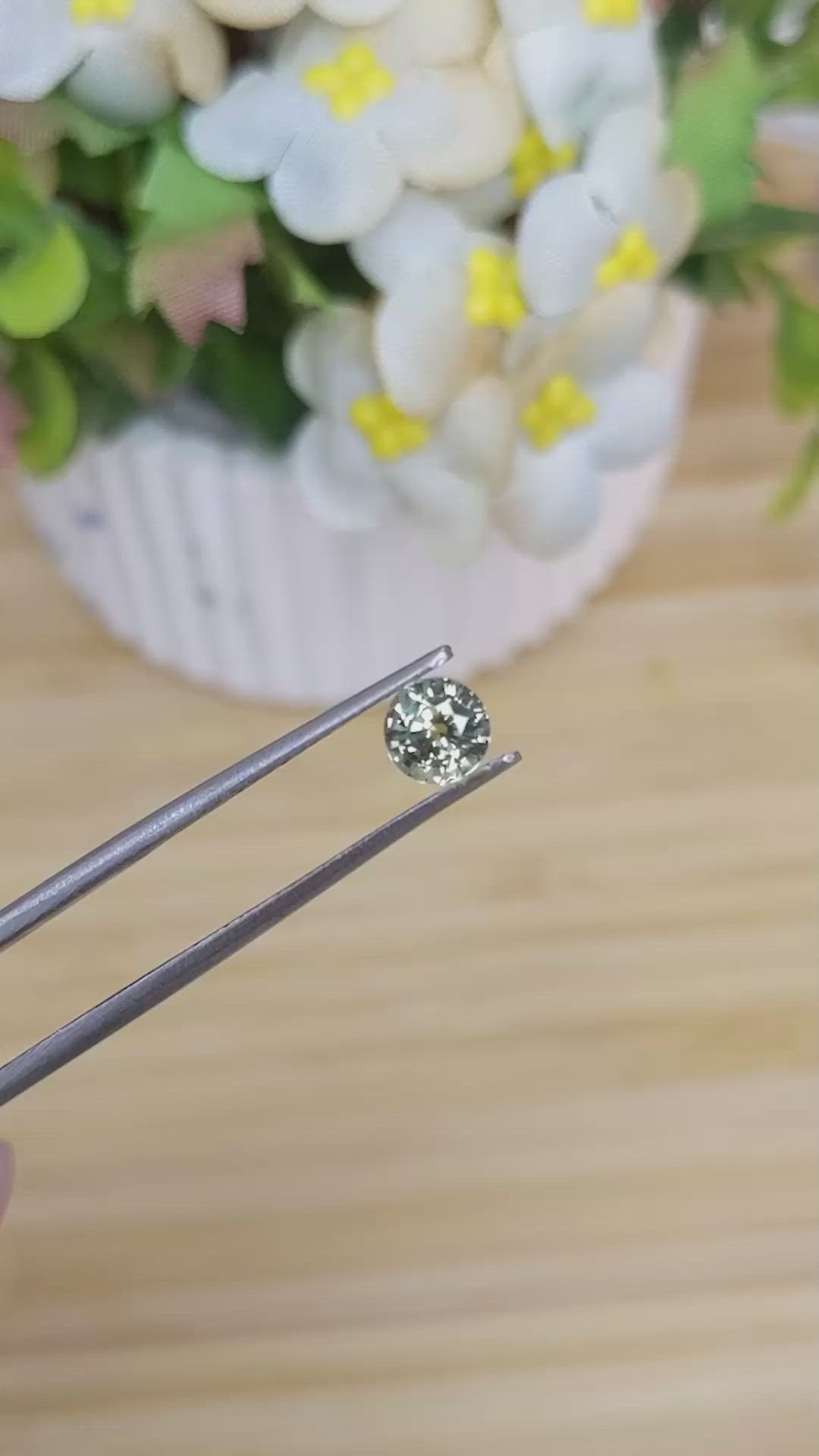 0.88 Ct. Yellowish Green Sapphire from Madagascar Size Video
