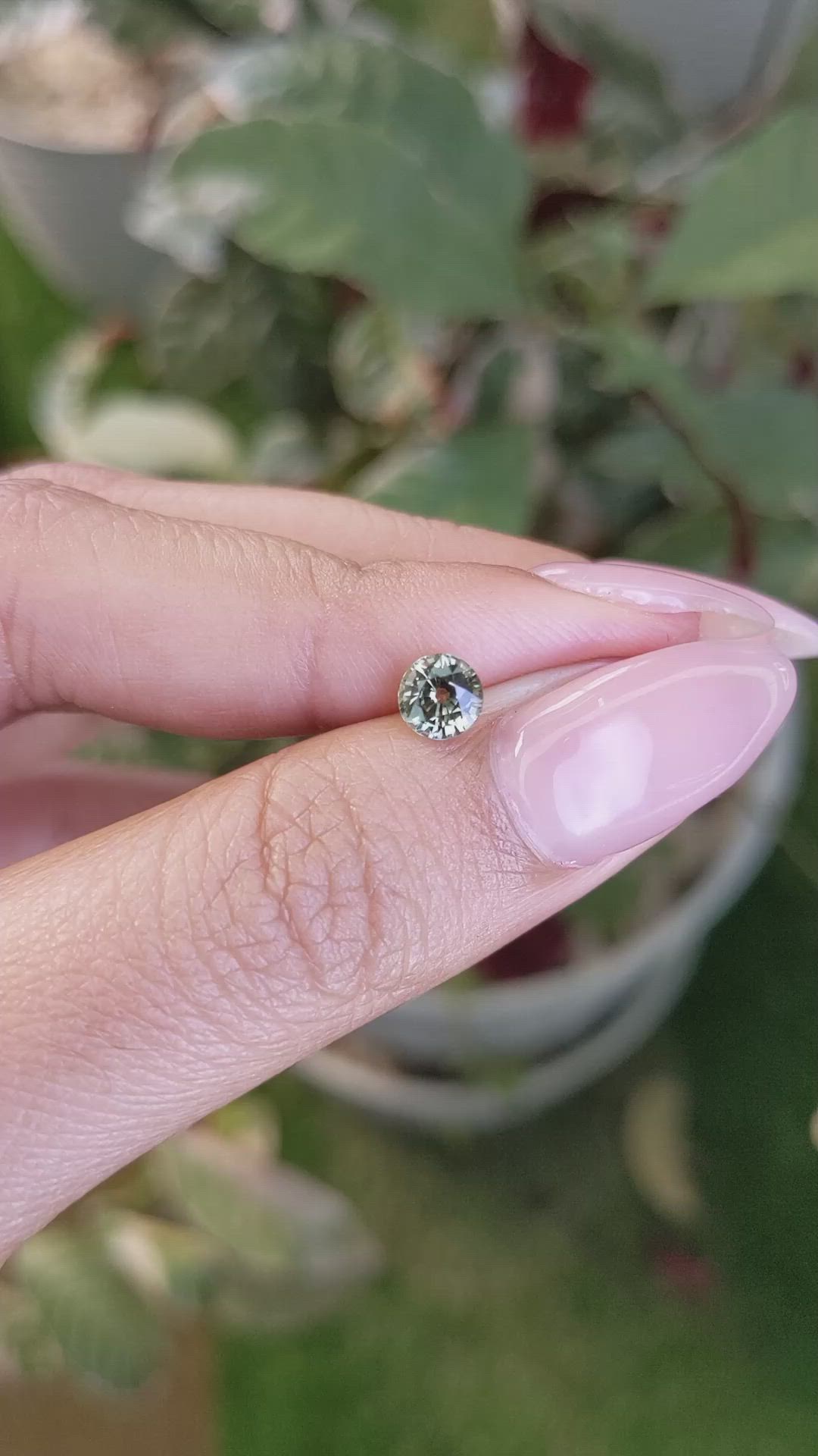0.88 Ct. Yellowish Green Sapphire from Madagascar Size Video