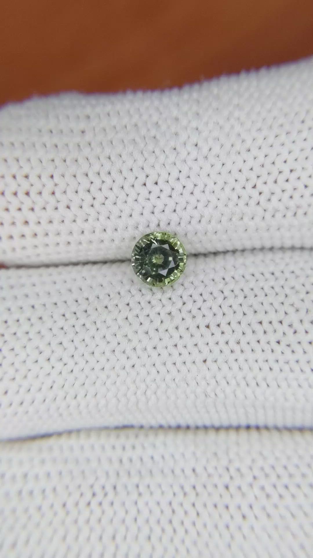 0.88 Ct. Yellowish Green Sapphire from Madagascar Size Video