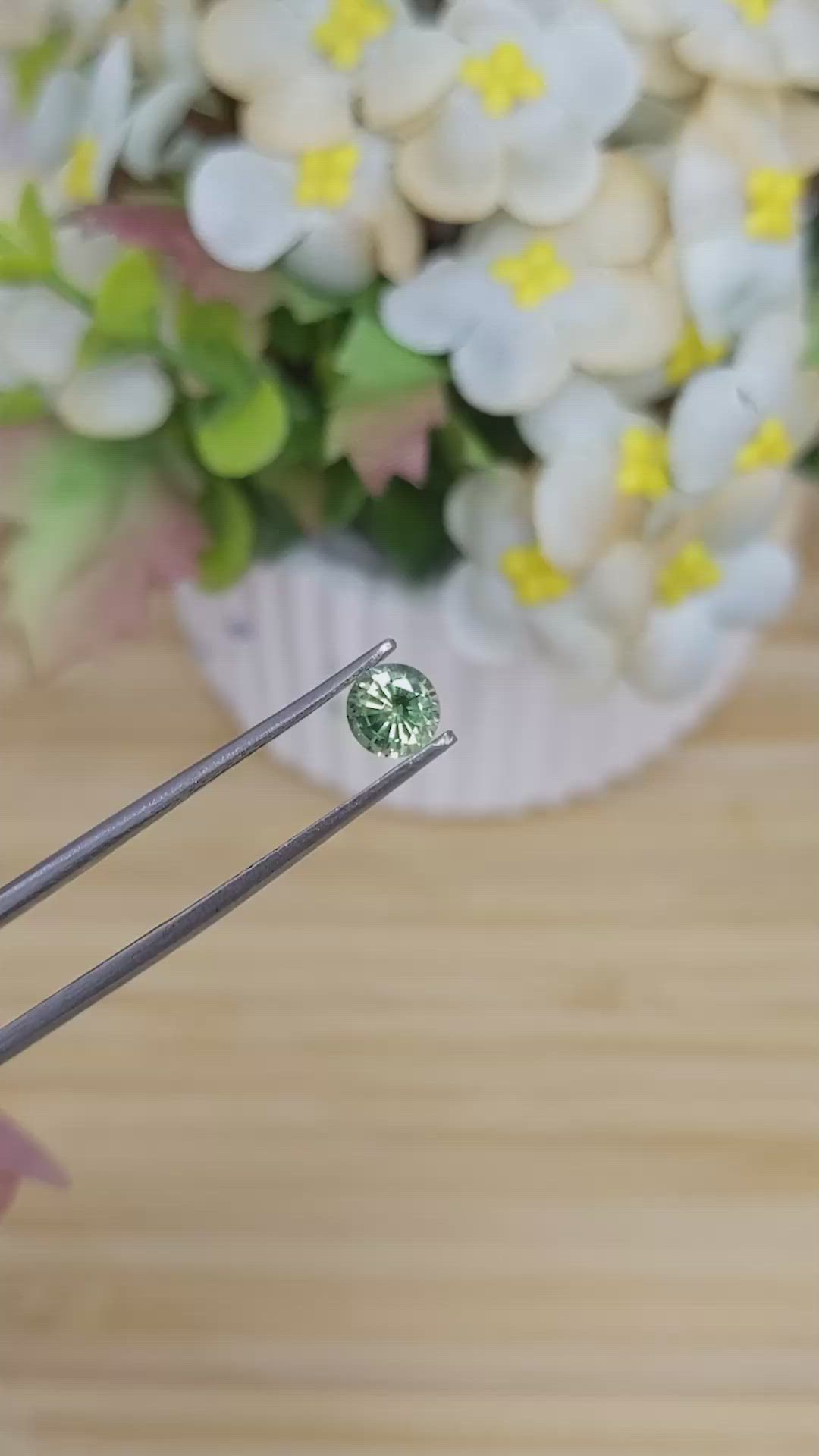 0.69 Ct. Yellowish Green Sapphire from Madagascar Size Video