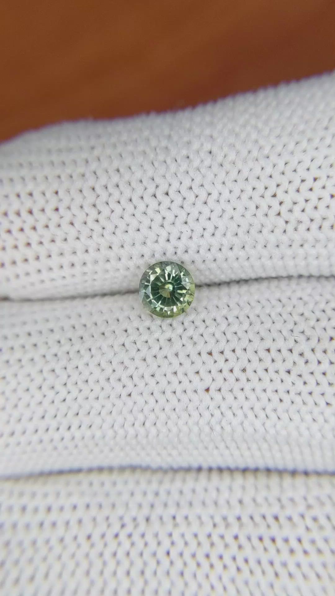 0.69 Ct. Yellowish Green Sapphire from Madagascar Size Video