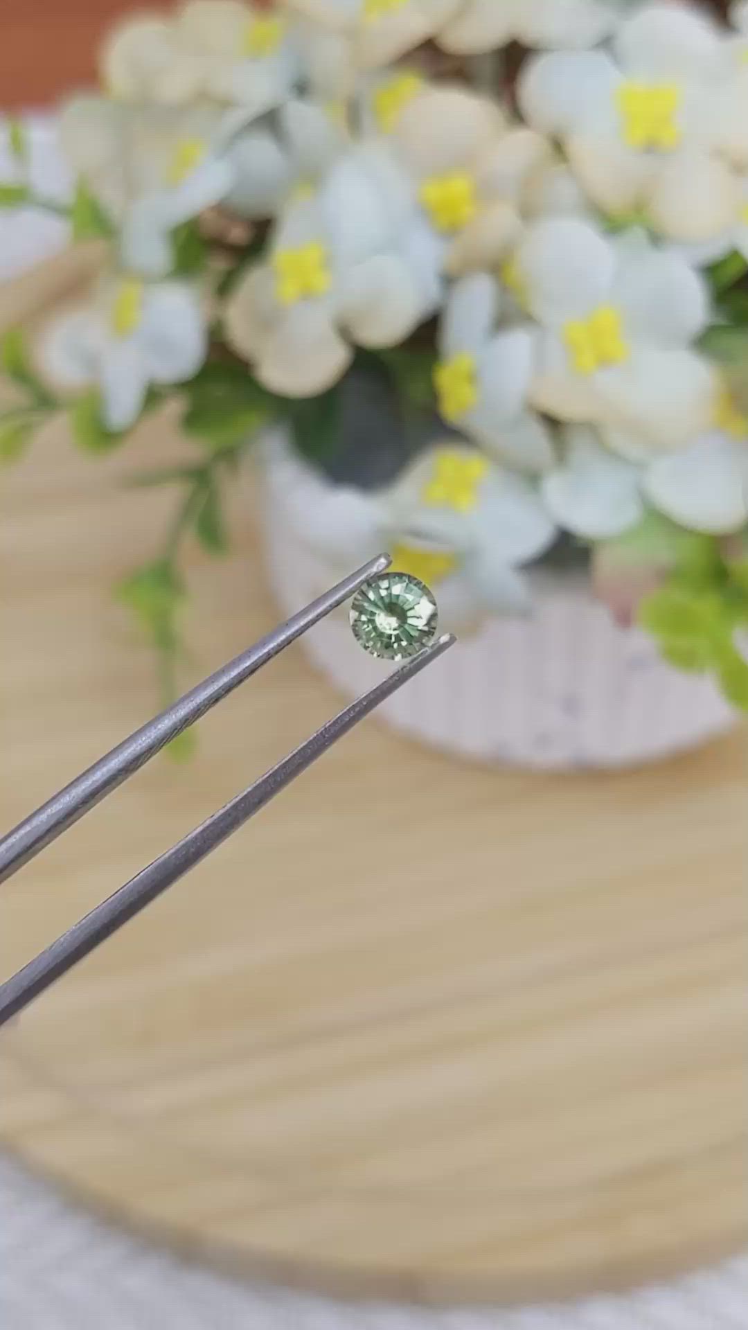 0.62 Ct. Yellowish Green Sapphire from Madagascar Size Video