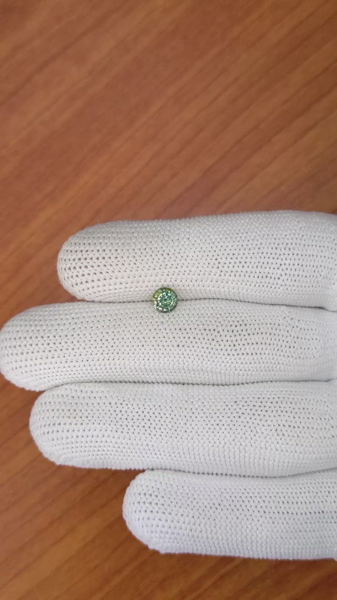 0.63 Ct. Bluish Green Sapphire from Madagascar Size Video
