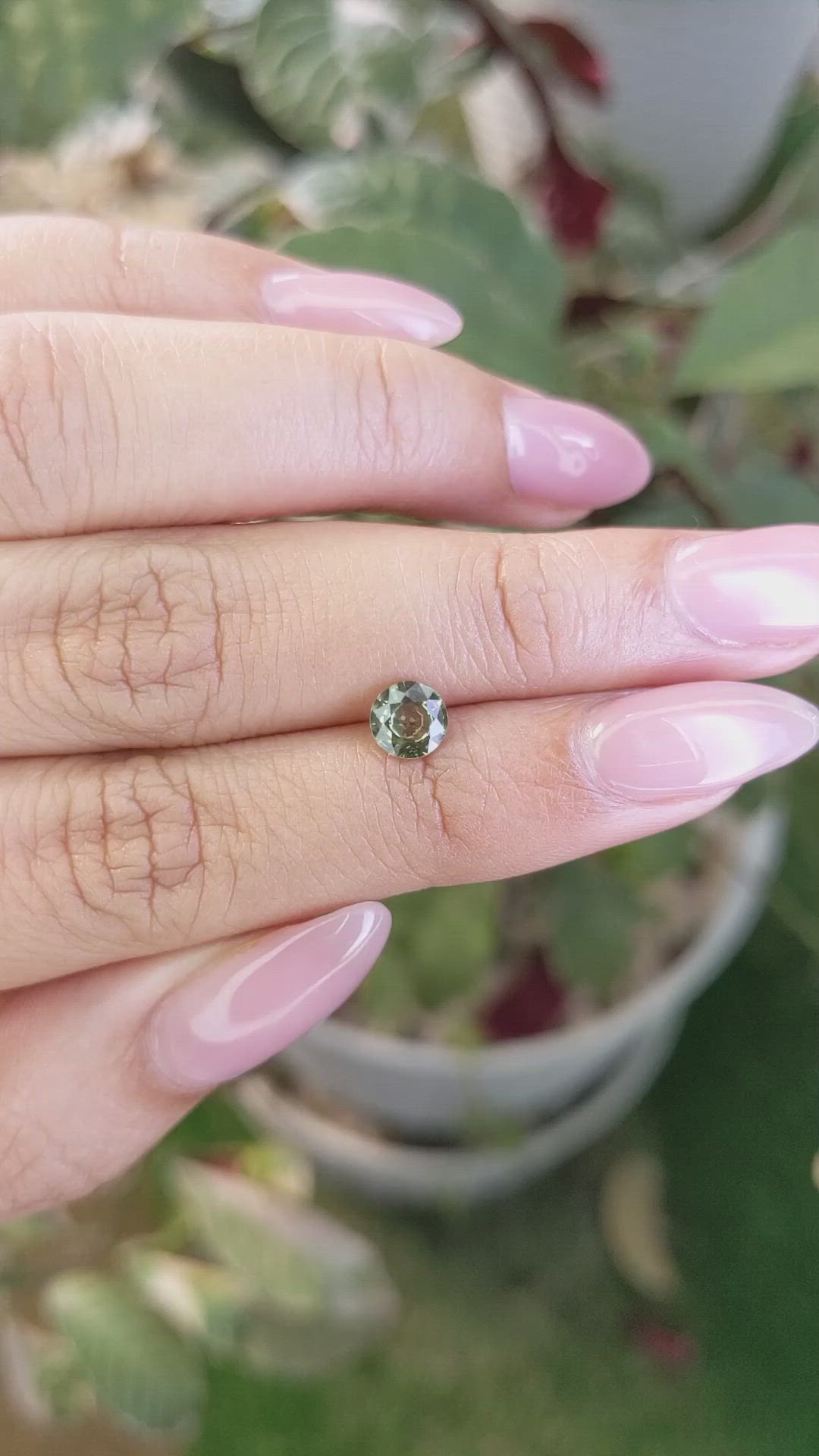 0.81 Ct. Yellowish Green Sapphire from Madagascar Size Video