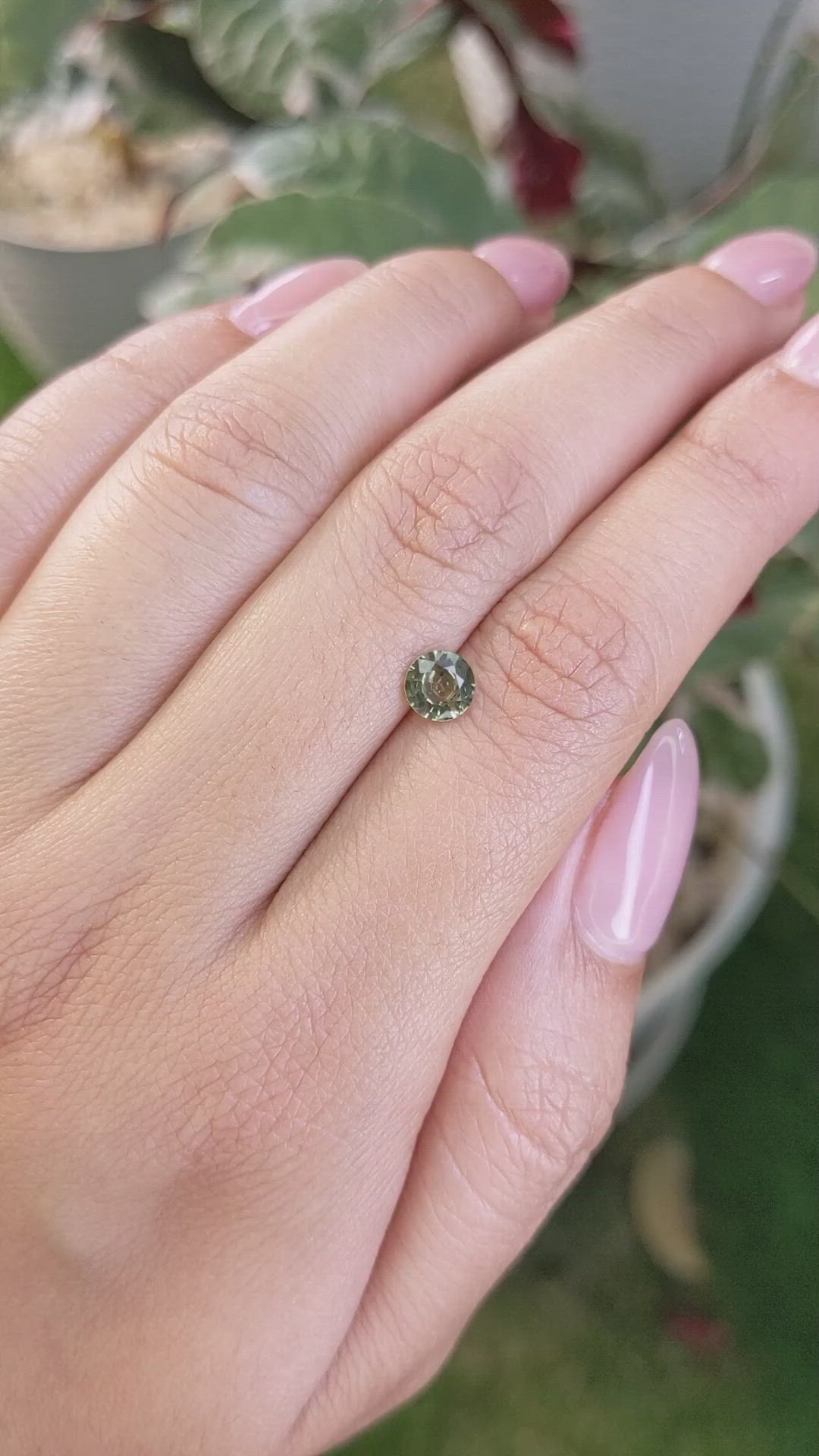 0.81 Ct. Yellowish Green Sapphire from Madagascar Size Video