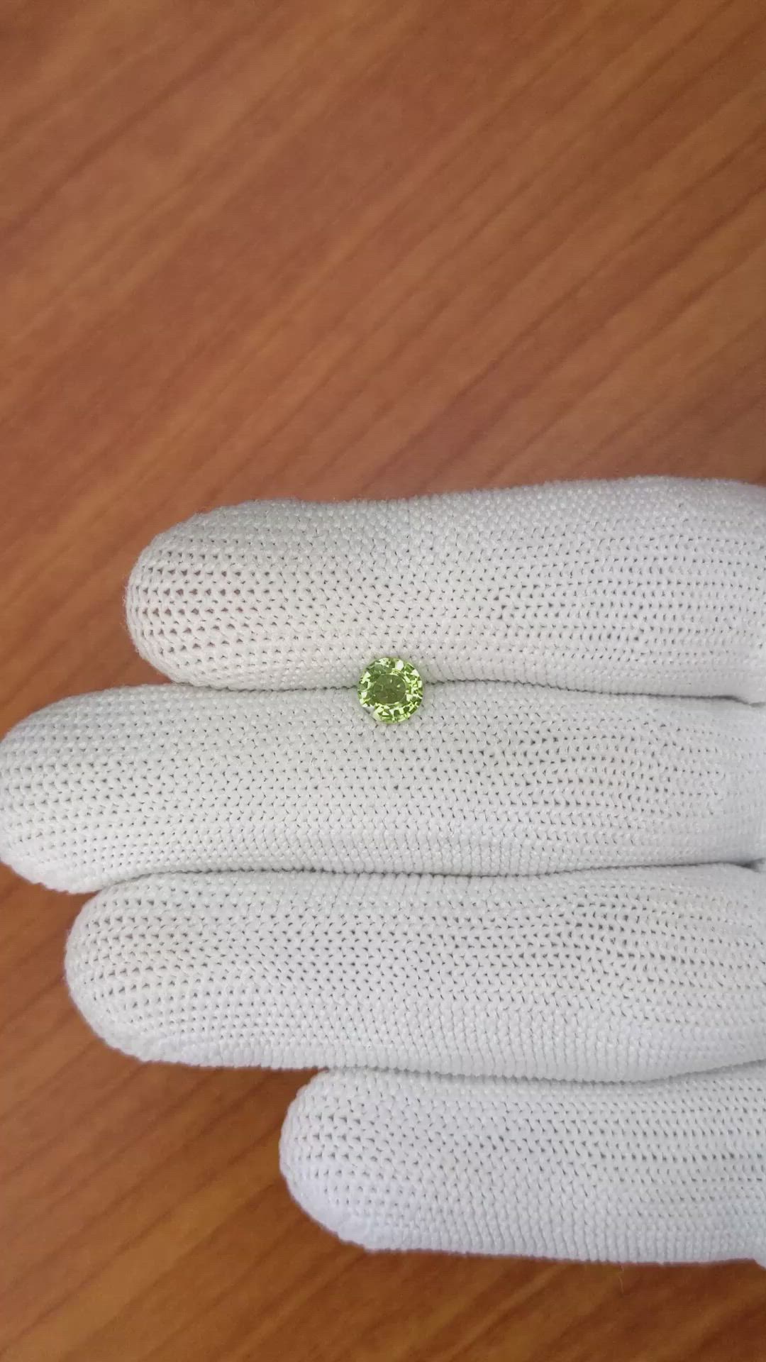 0.81 Ct. Yellowish Green Sapphire from Madagascar Size Video