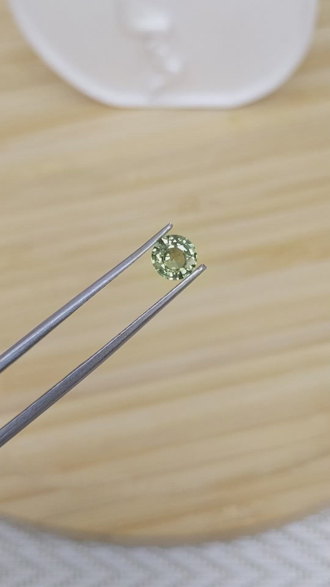 0.81 Ct. Yellowish Green Sapphire from Madagascar Size Video