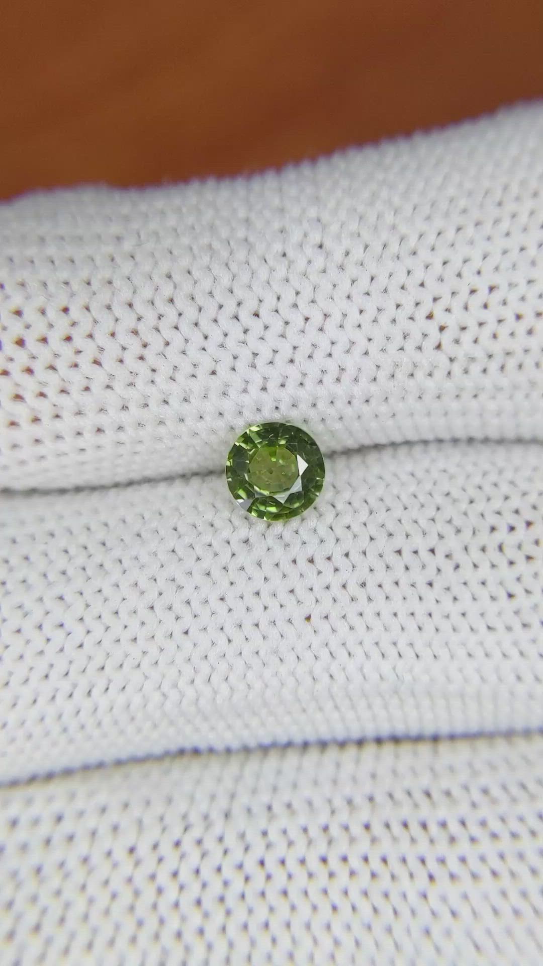 0.81 Ct. Yellowish Green Sapphire from Madagascar Size Video