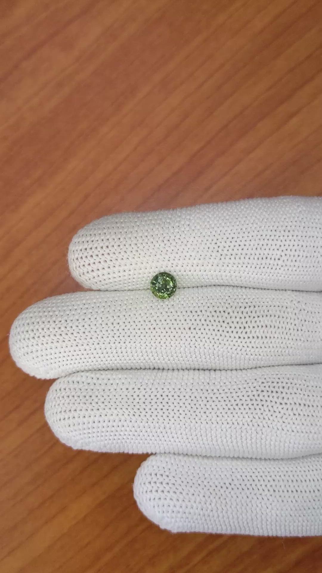 0.76 Ct. Yellowish Green Sapphire from Madagascar Size Video