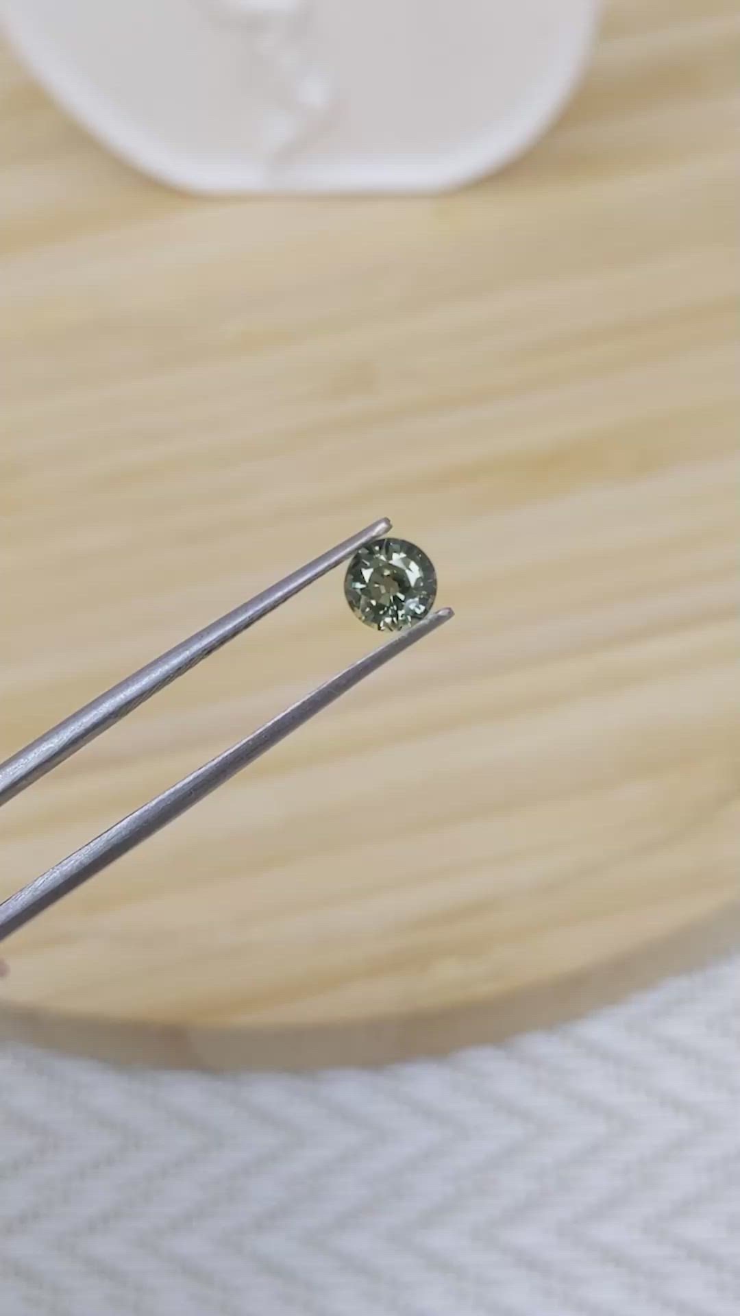 0.76 Ct. Yellowish Green Sapphire from Madagascar Size Video