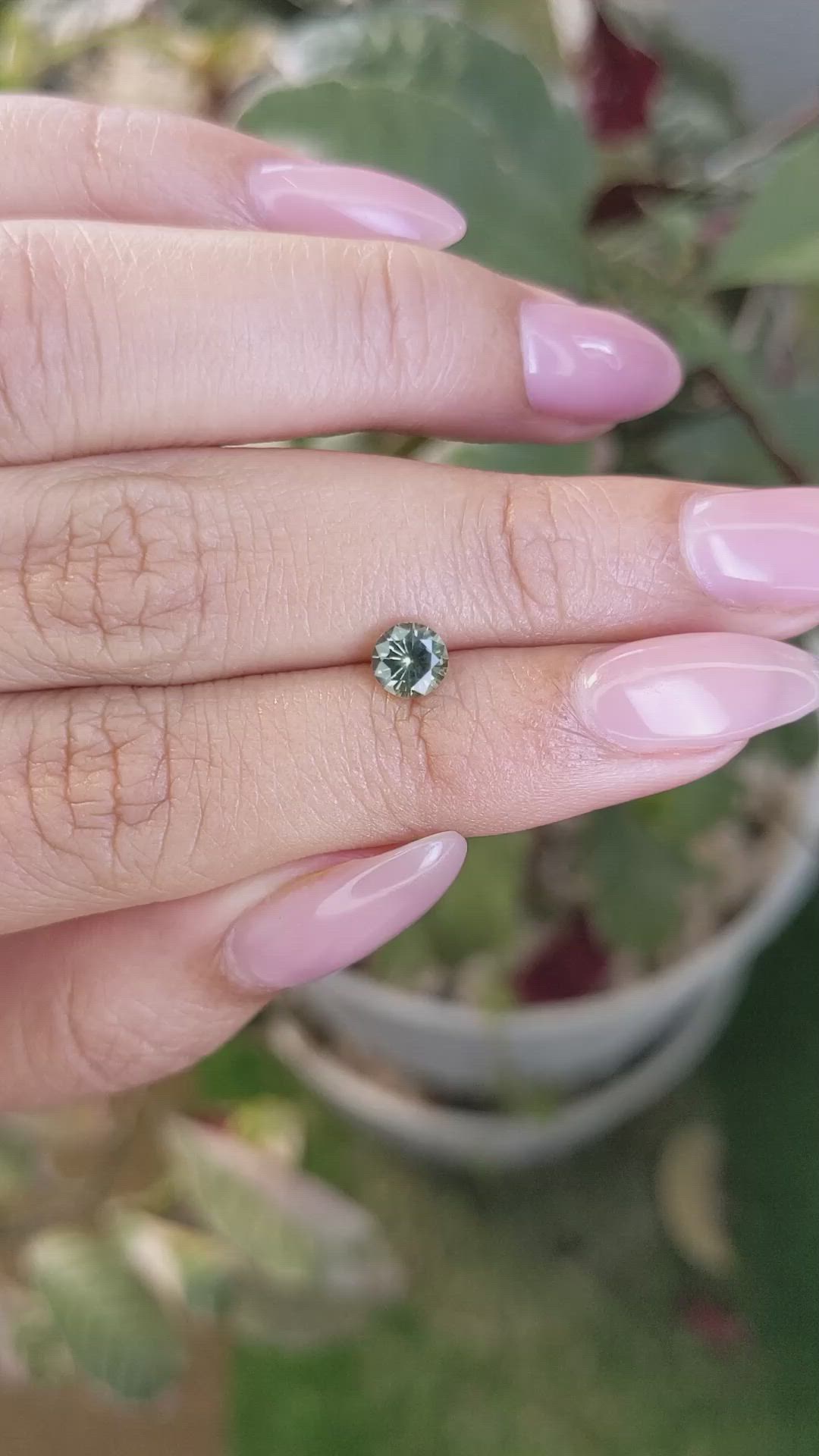 0.69 Ct. Yellowish Green Sapphire from Madagascar Size Video