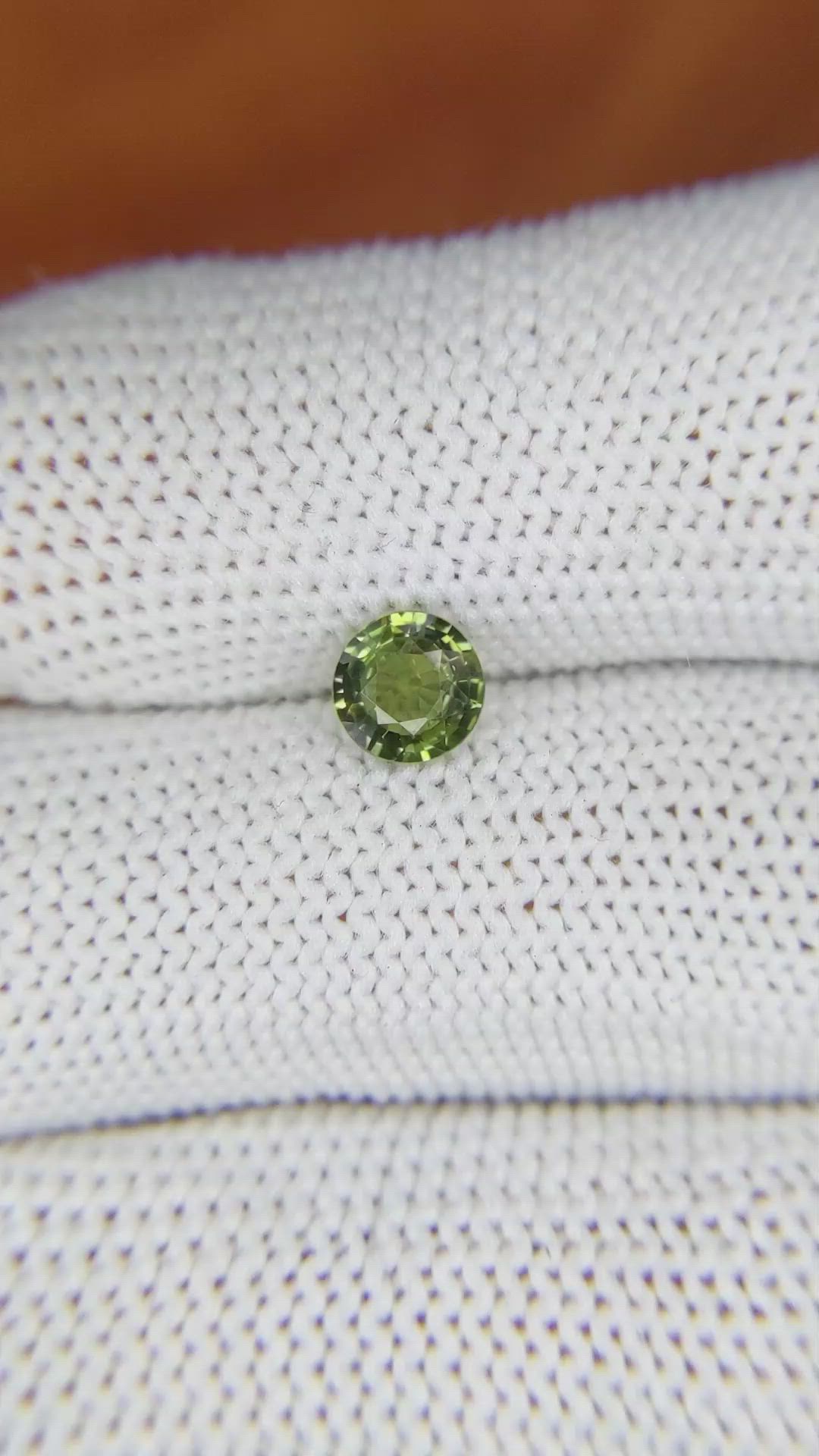 0.87 Ct. Yellowish Green Sapphire from Madagascar Size Video
