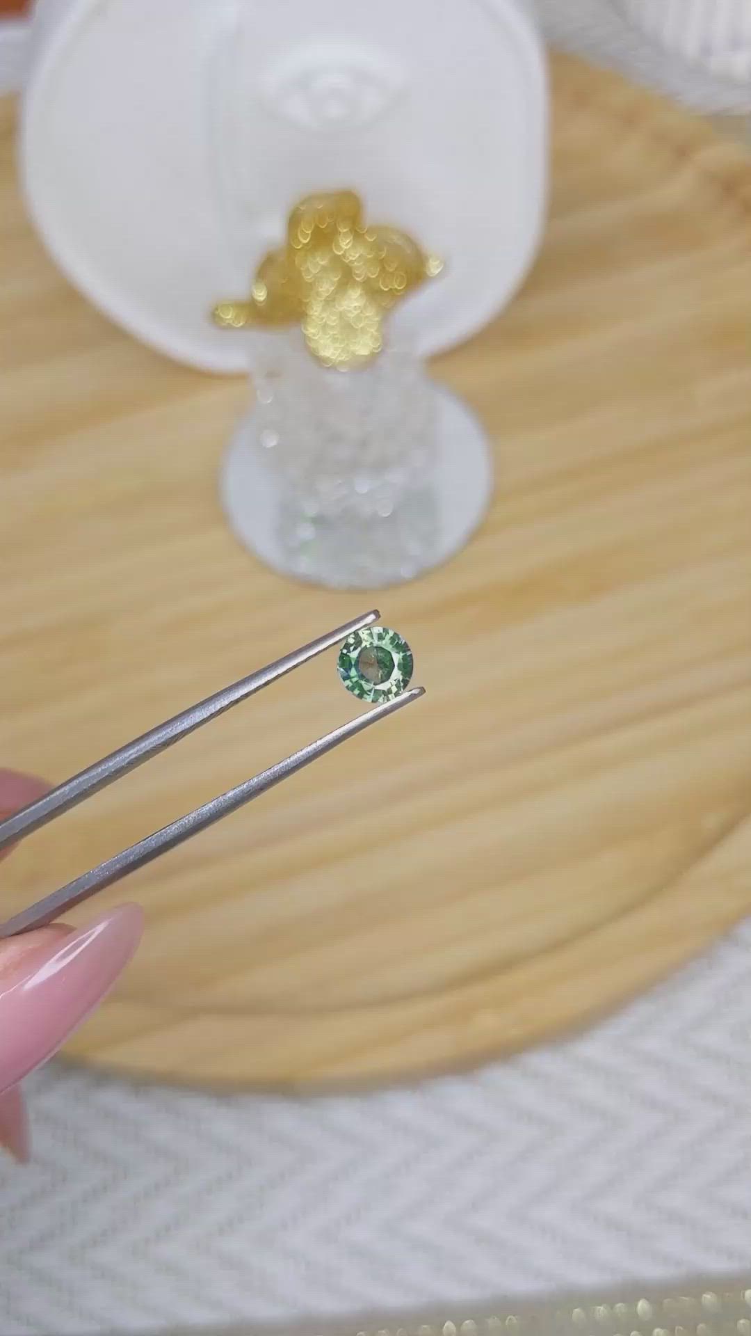 0.77 Ct. Bluish Green Sapphire from Madagascar Size Video