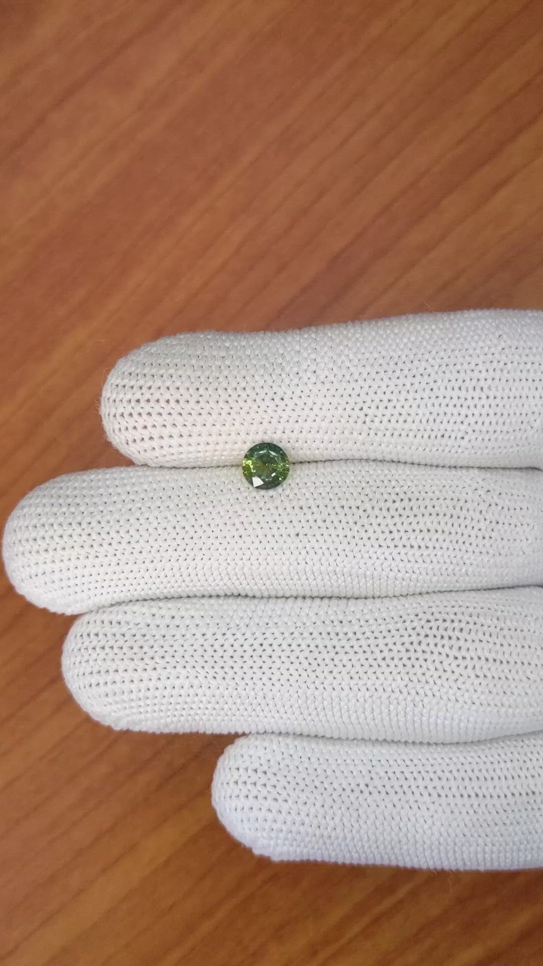 0.77 Ct. Bluish Green Sapphire from Madagascar Size Video