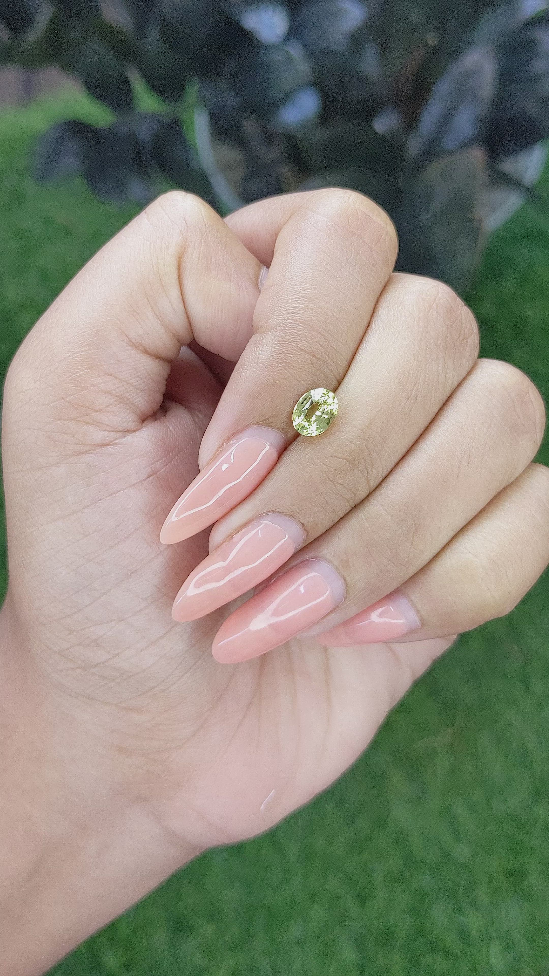 1.01 Ct. Yellowish Green Sapphire from Ceylon (Sri Lanka) Size Video