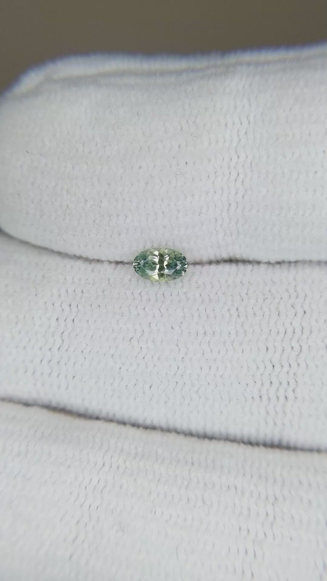 0.27 Ct. Yellowish Green Sapphire from Montana Size Video