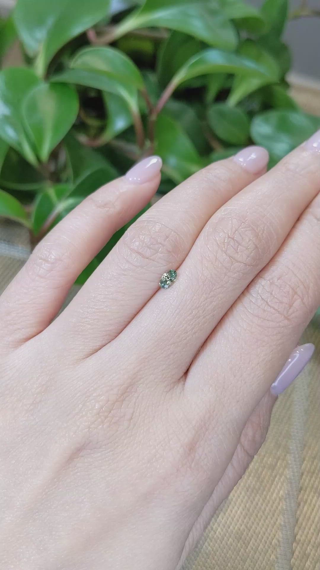 0.27 Ct. Yellowish Green Sapphire from Montana Size Video