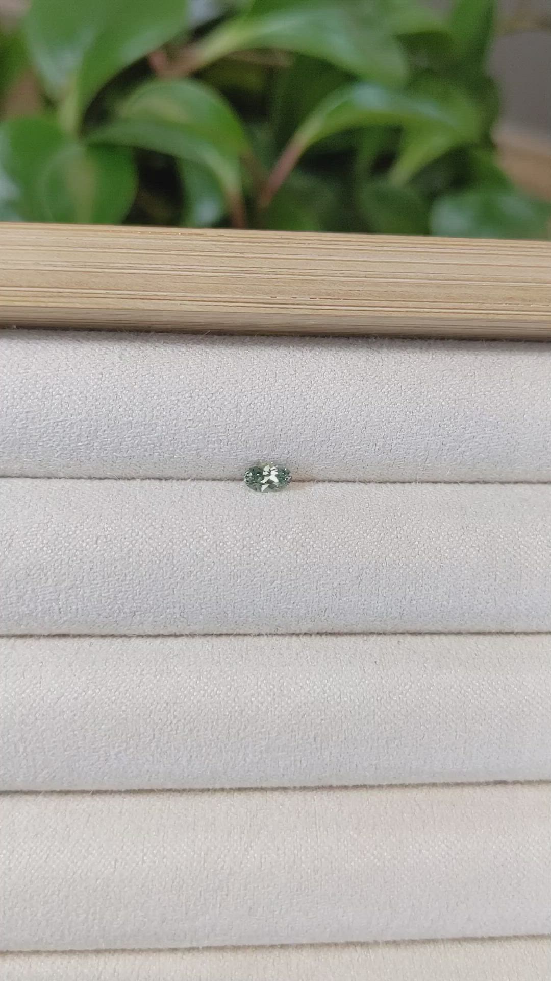 0.27 Ct. Yellowish Green Sapphire from Montana Size Video
