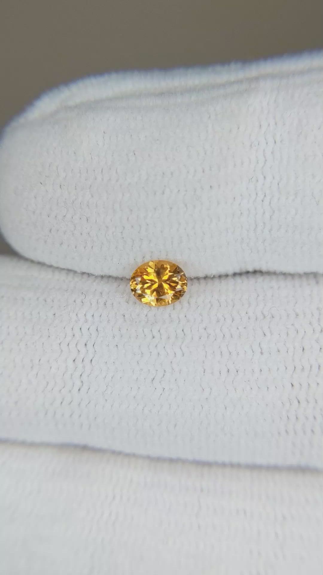 0.42 Ct. Orange Sapphire from Montana Size Video