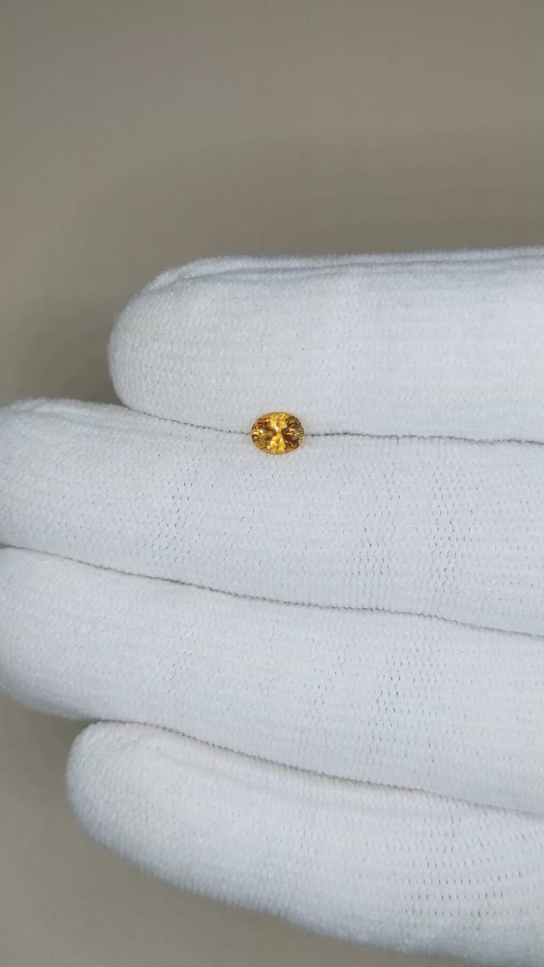 0.42 Ct. Orange Sapphire from Montana Size Video